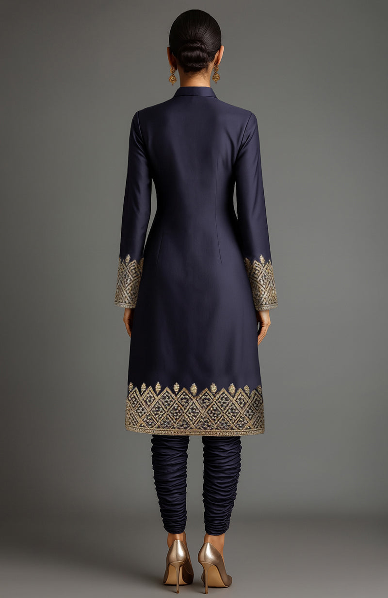 Midnight navy silk sherwani jacket with gold zardozi embroidery and matching ruched churidar pants.