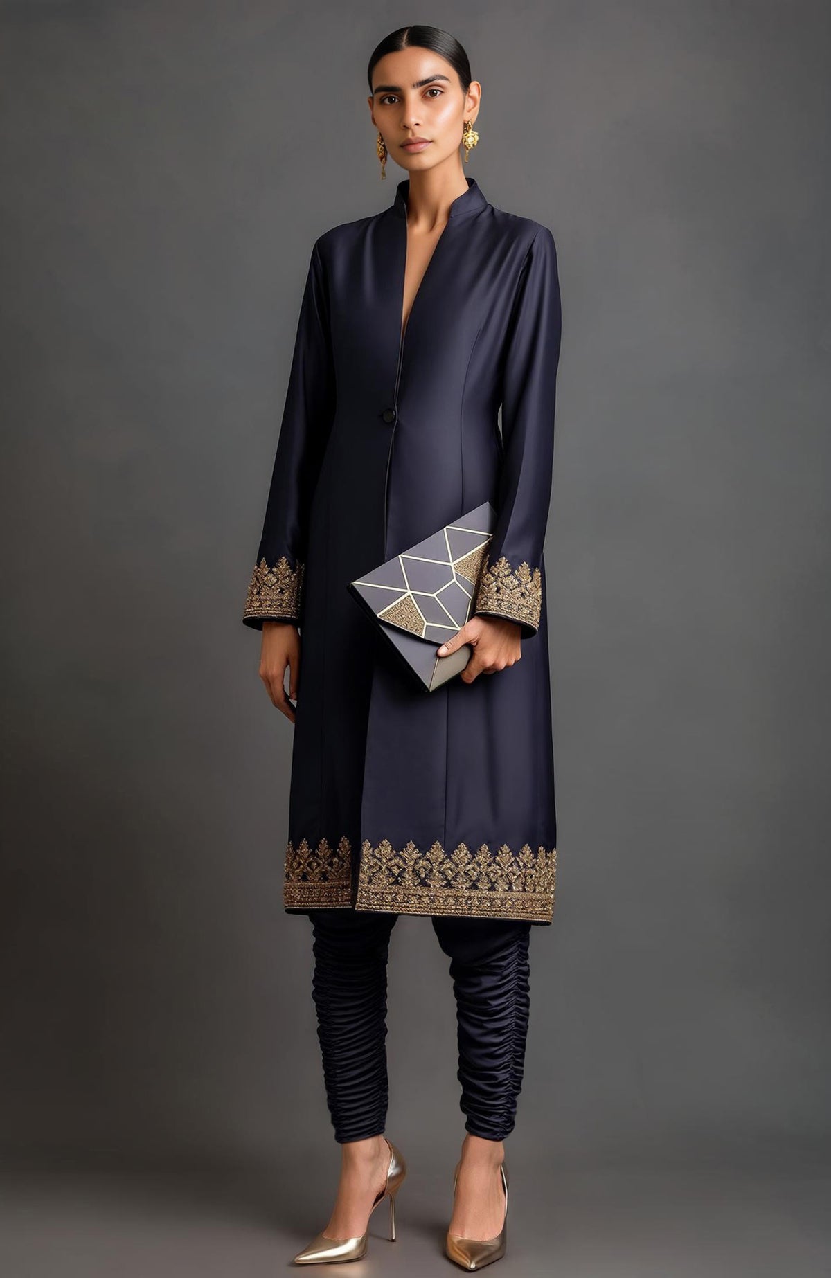 Midnight blue sherwani-style jacket set with gold embroidery and ruched churidar trousers