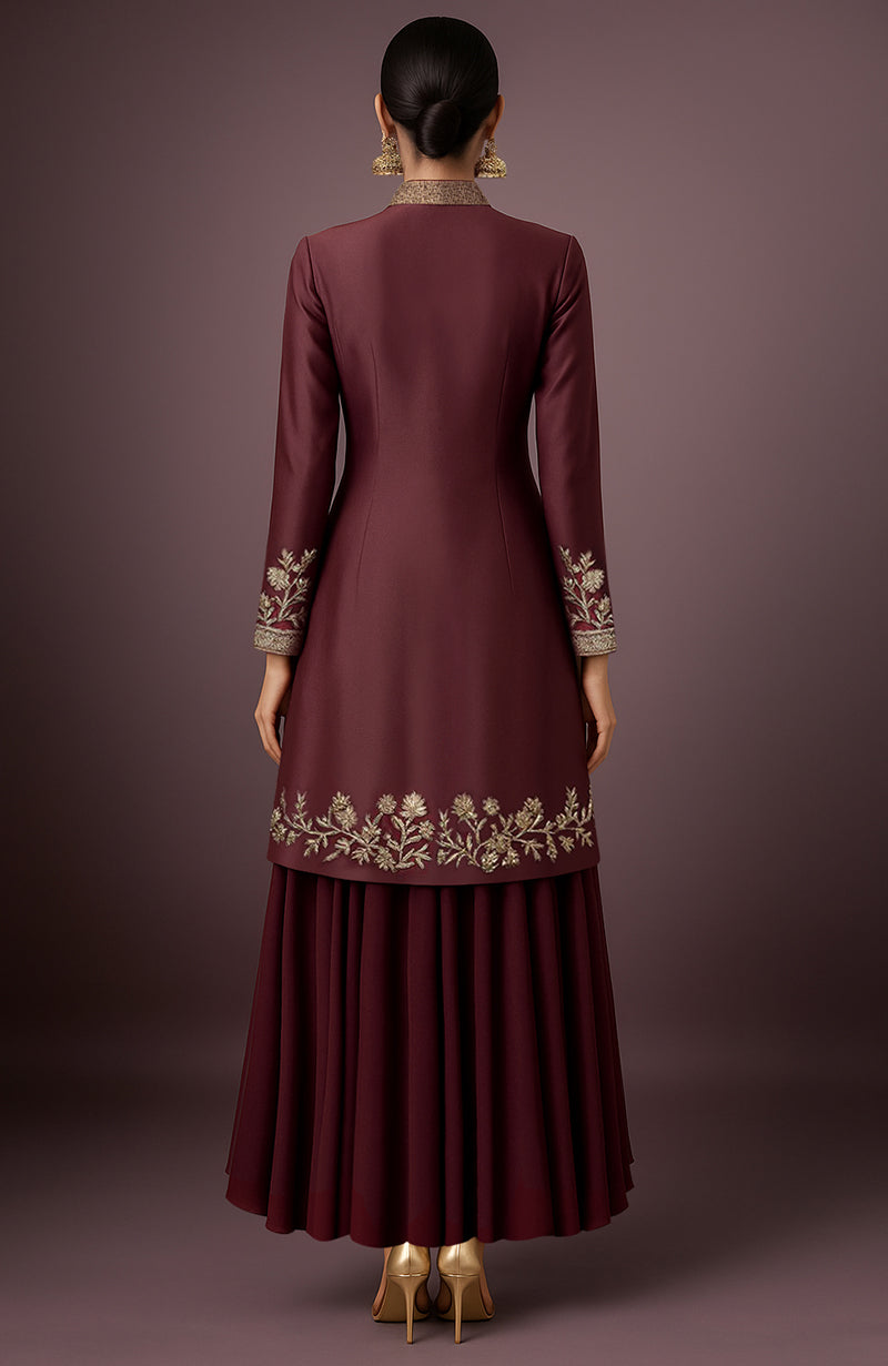 Deep wine silk sherwani jacket with gold zardozi embroidery and matching high-low georgette skirt