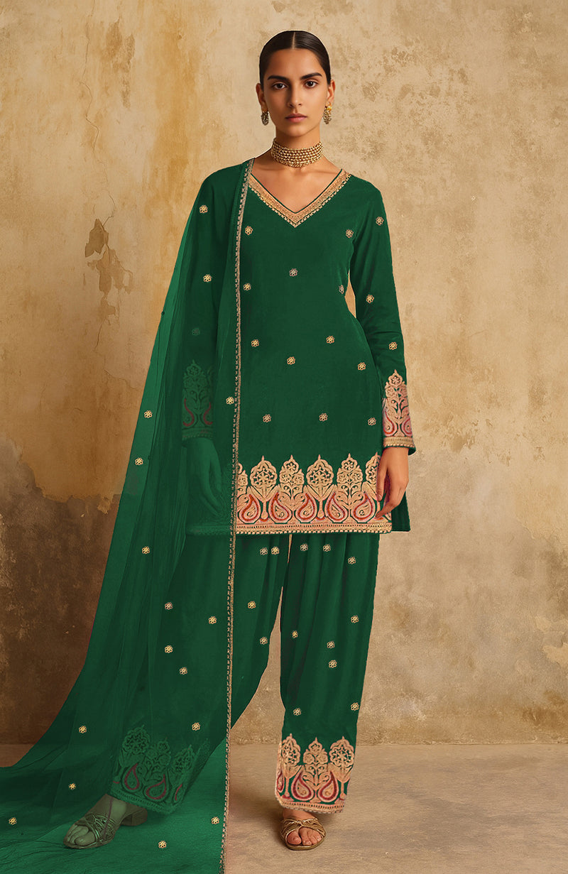 Deep rani pink Kashmiri tilla farshi set with gold and blue embroidery, V-neck kurta, and sheer dupatta.