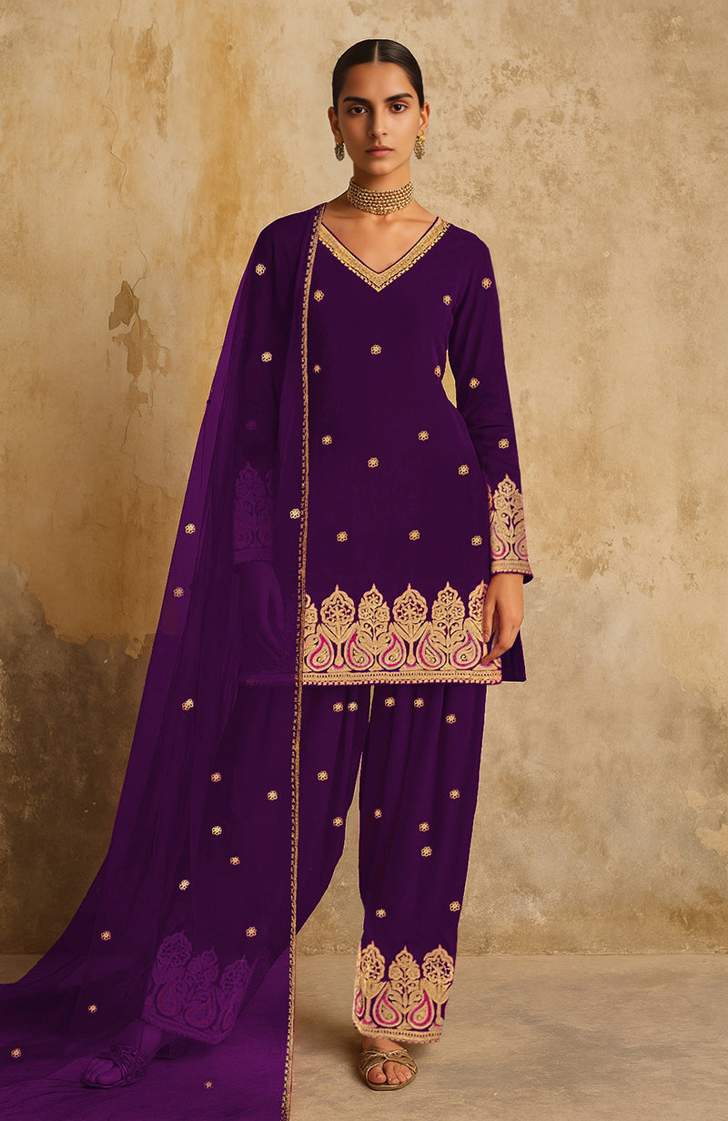 Emerald green Kashmiri farshi set with gold and blue tilla embroidery and sheer dupatta.