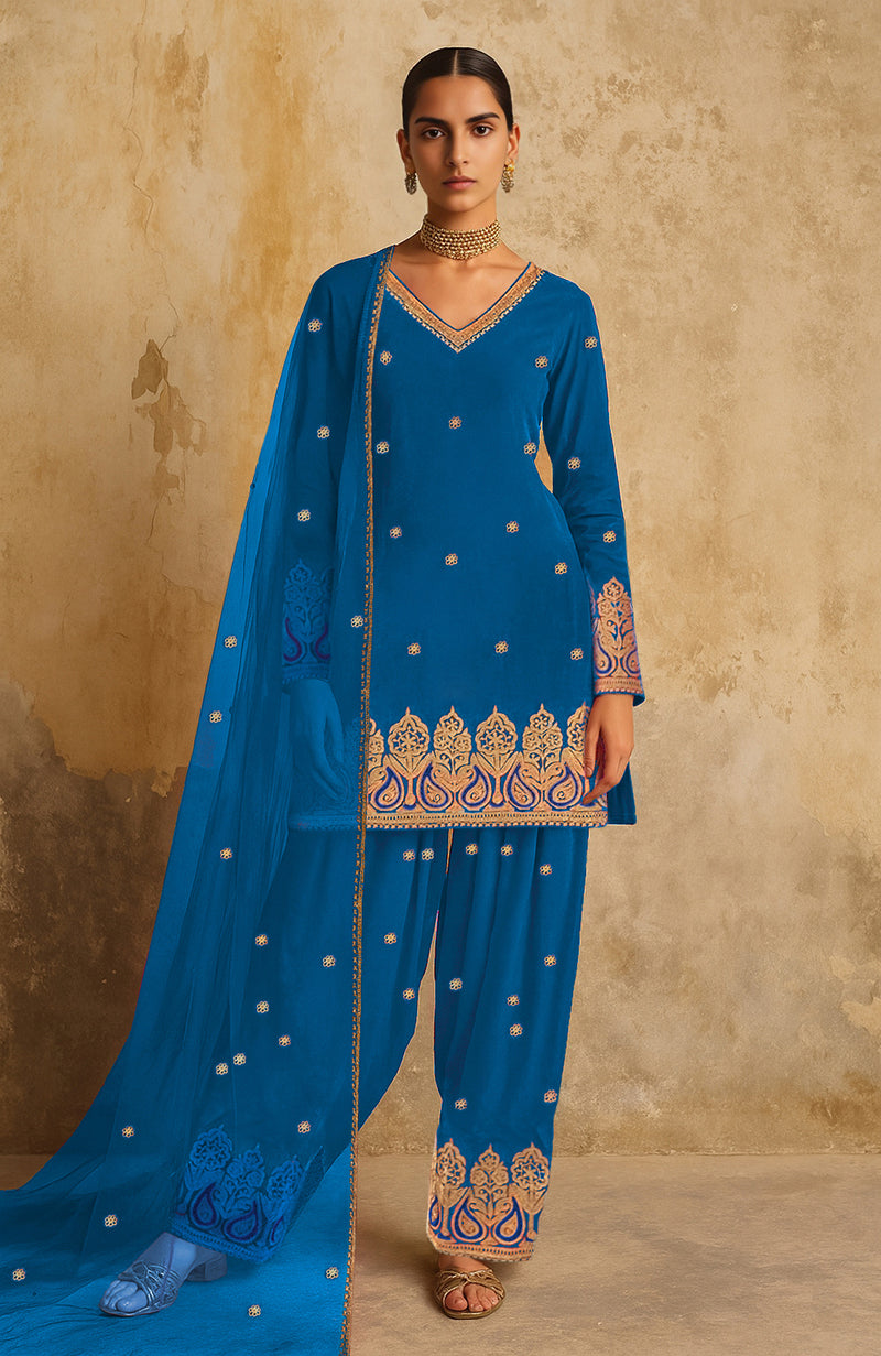 Teal blue Kashmiri tilla farshi set with gold and blue embroidery, V-neck kurta, sheer dupatta.