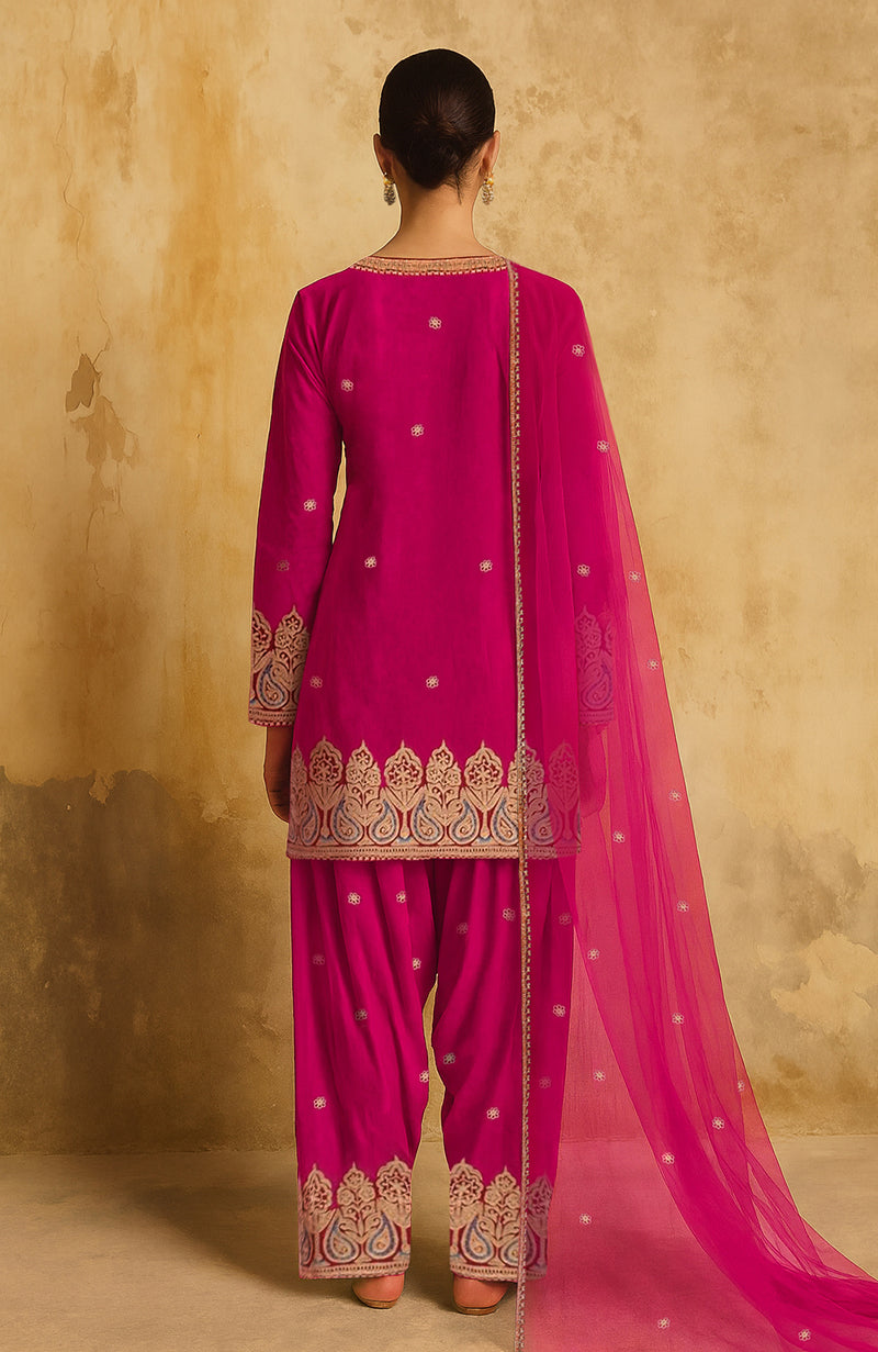 Deep rani pink Kashmiri Tilla embroidered farshi set with V-neck kurta and sheer dupatta.