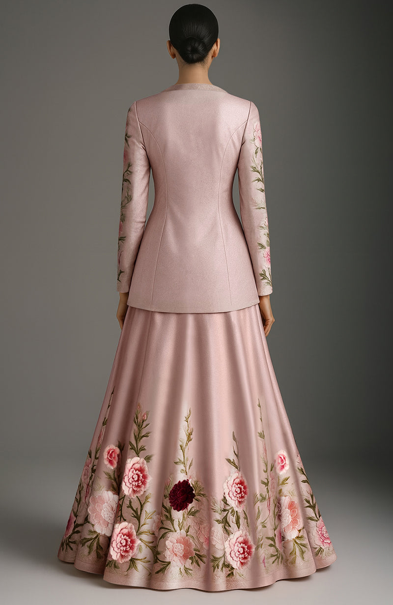 Blush pink skirt set with floral embroidery, long fitted jacket, flared skirt, and organza dupatta.