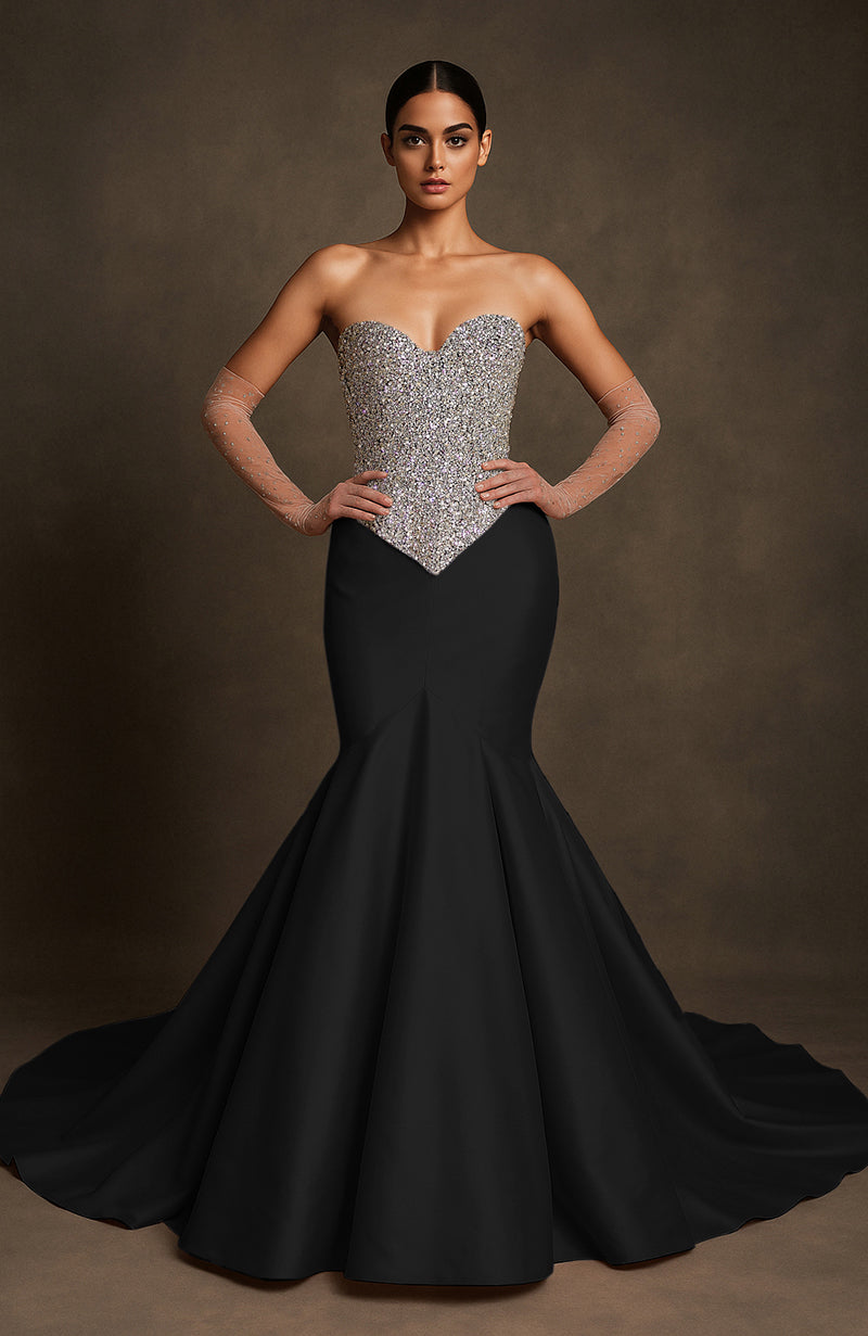 Strapless black mermaid gown with silver crystal-encrusted bodice and flared floor-length skirt