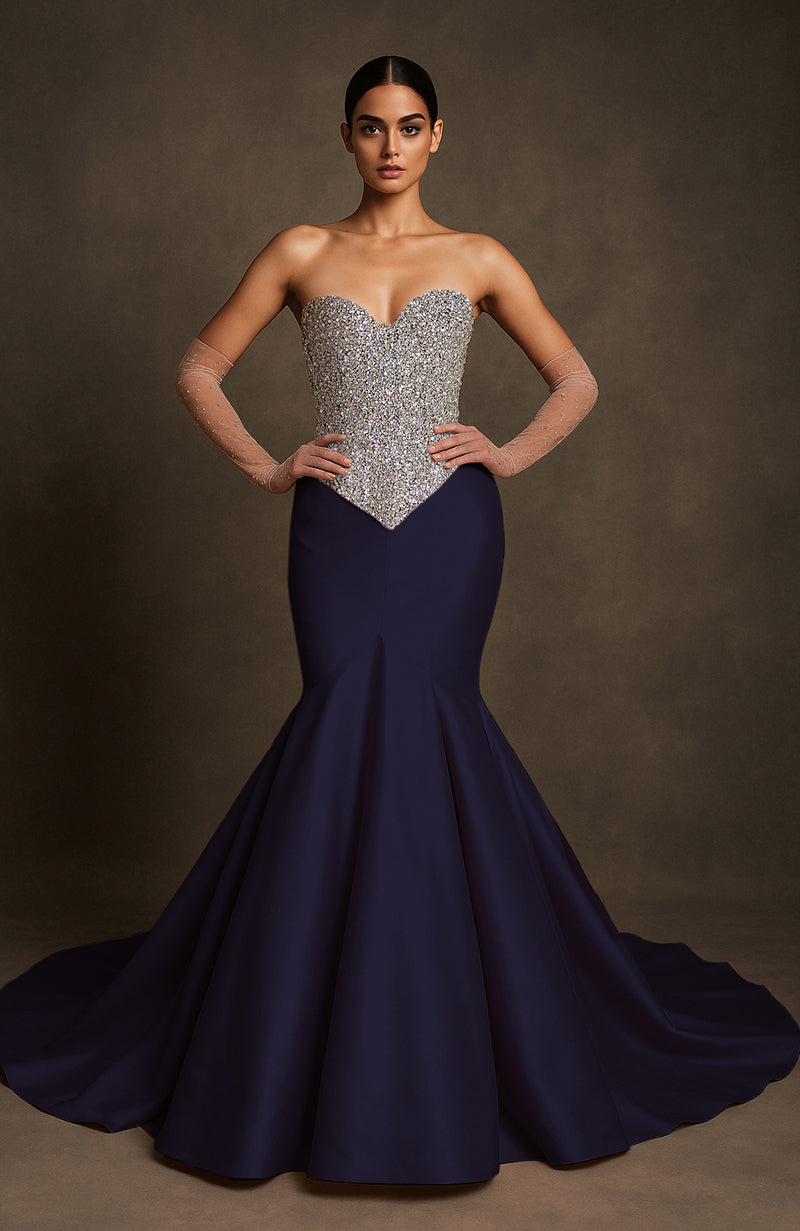 Strapless black mermaid gown with silver crystal-encrusted bodice and flared floor-length skirt