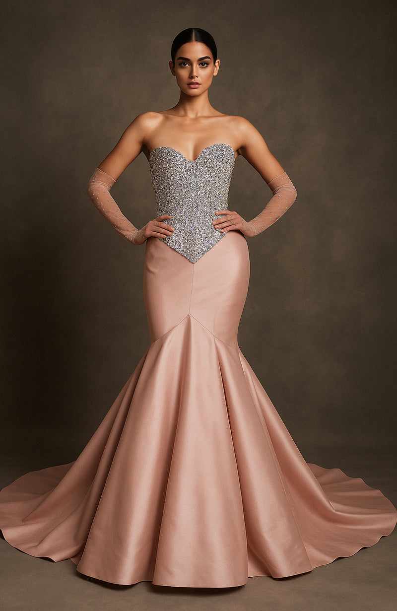 Strapless blush mermaid gown with silver crystal-encrusted bodice and flared floor-length skirt