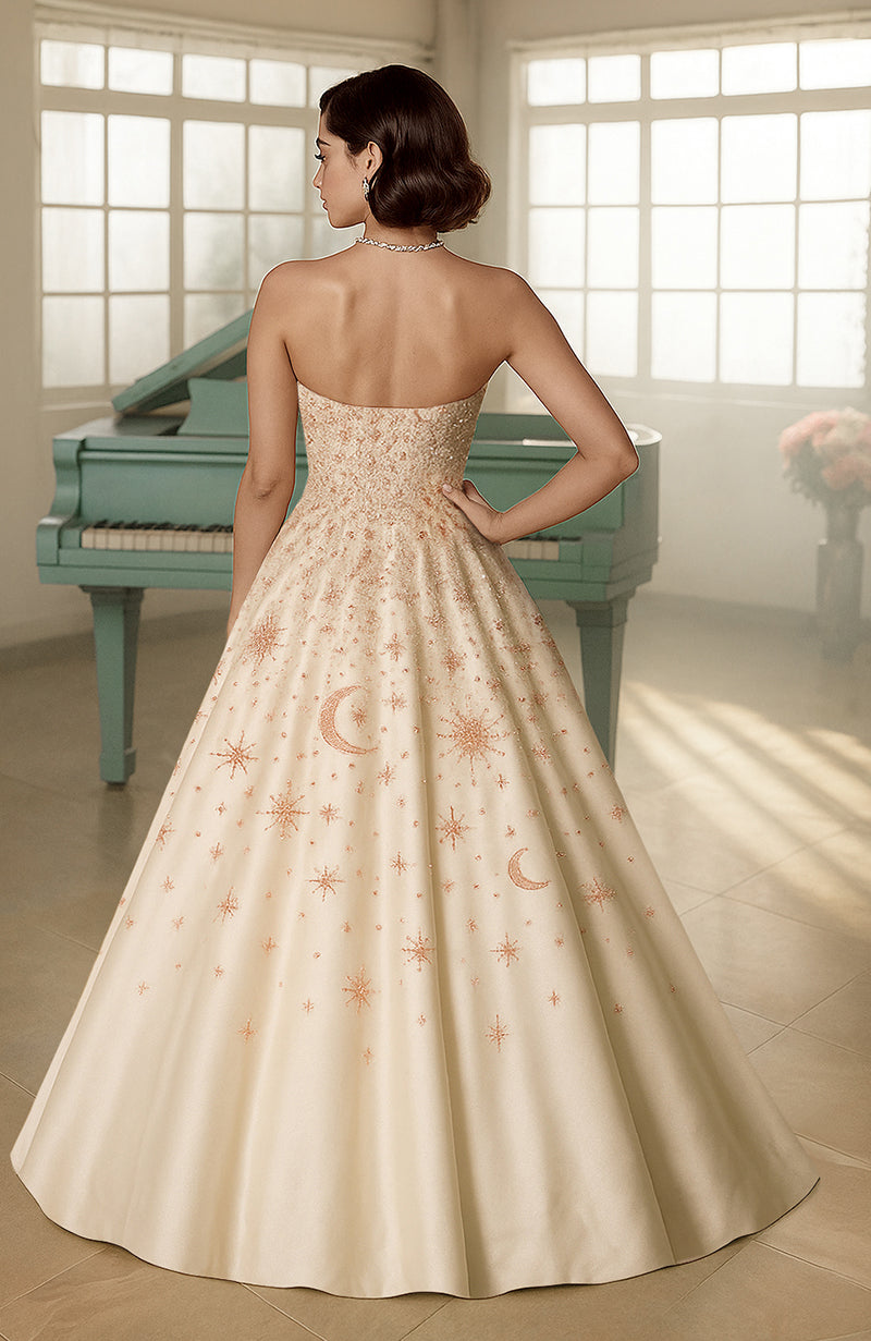 Ivory strapless ball gown with crystal hand embroidery of stars and moons