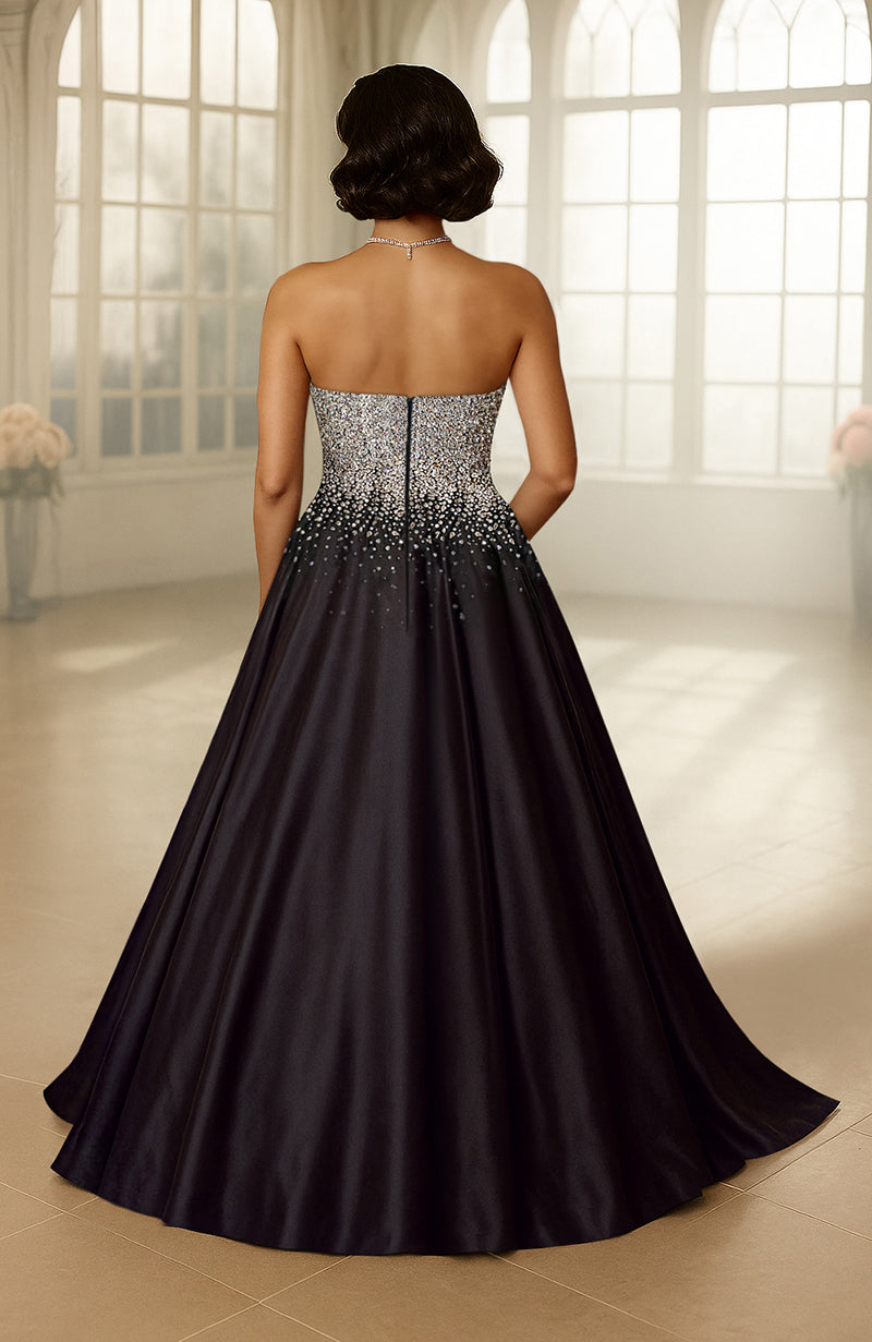 Black strapless gown with crystal embroidery on fitted bodice and flowing satin A-line skirt
