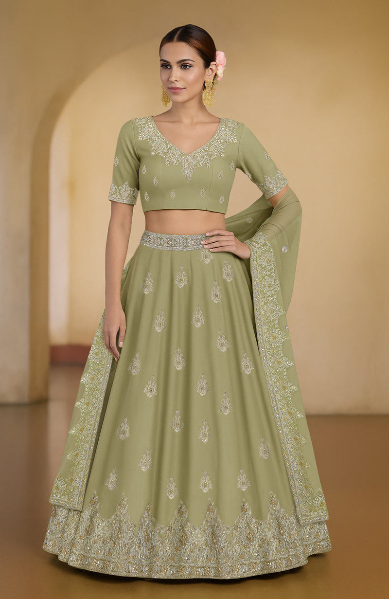 Kashmiri tilla and zardozi embroidered lehenga set in peacock green with flared silhouette.