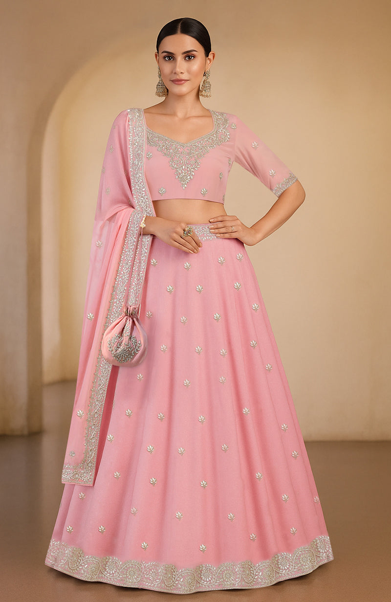 Illusion blue lehenga set with gota patti and zardozi embroidery, flared A-line silhouette.
