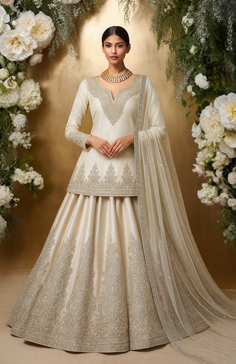 Ivory satin lehenga set with zari, sequin, and crystal embroidery and a tulle dupatta with pearls