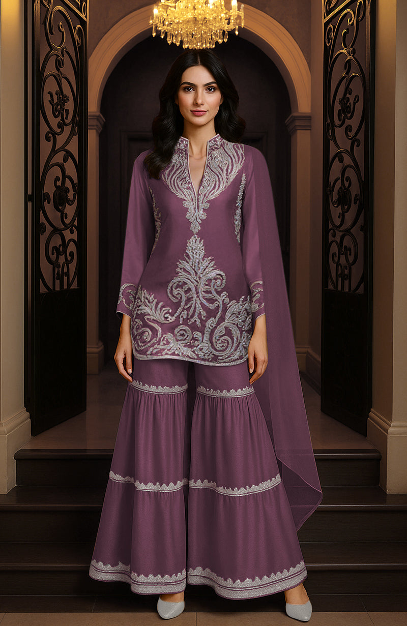 Mustard yellow gharara set with embroidered tunic, wide-legged pants, and matching draped piece.