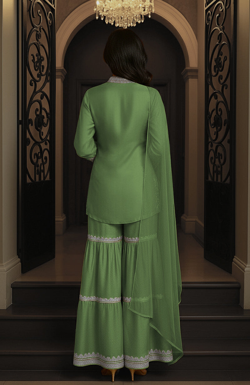 A traditional gharara set with embroidered tunic, wide-legged pants, and a matching draped piece.