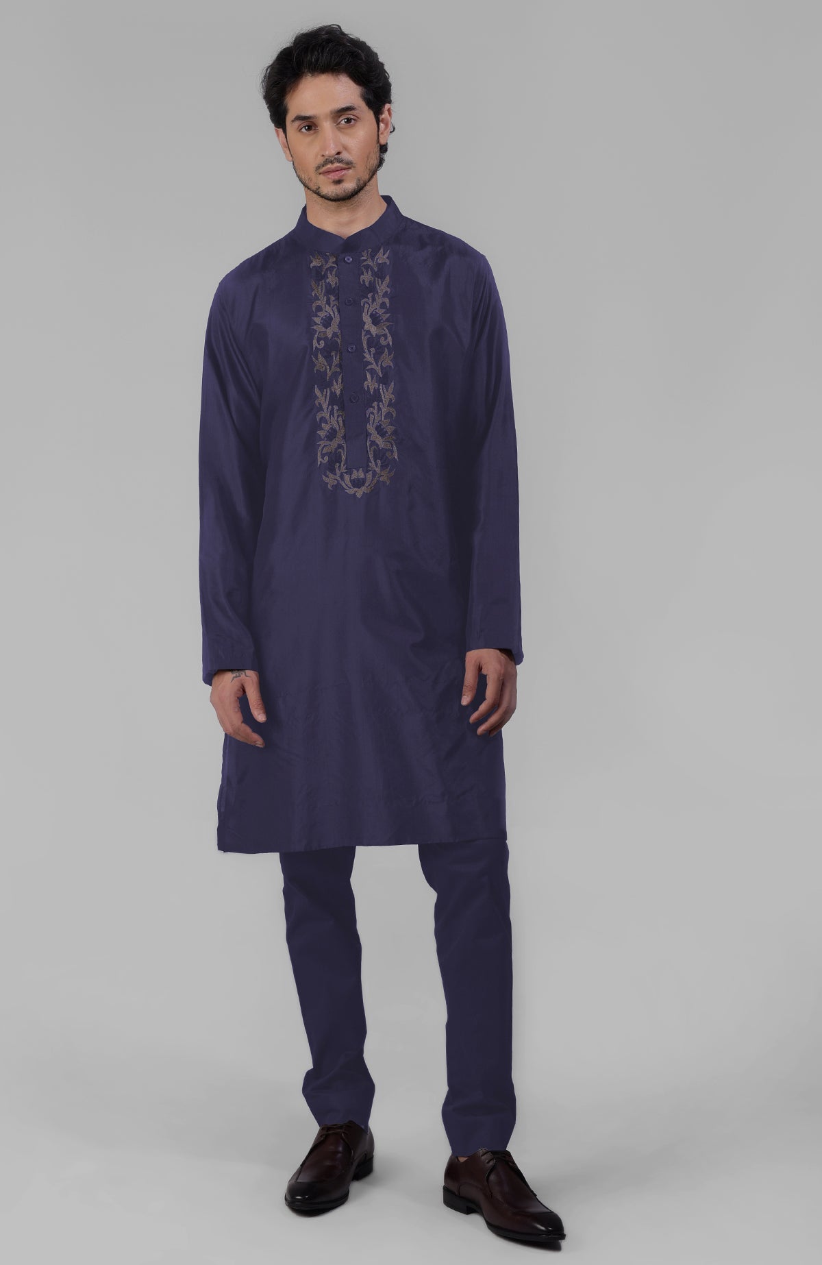 Black silk kurta with floral embroidered placket detail.