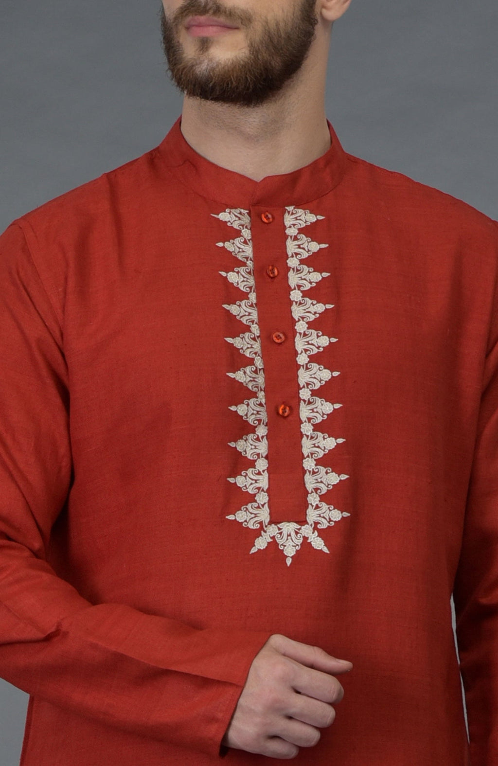 Red pure silk kurta with floral embroidered placket detail.