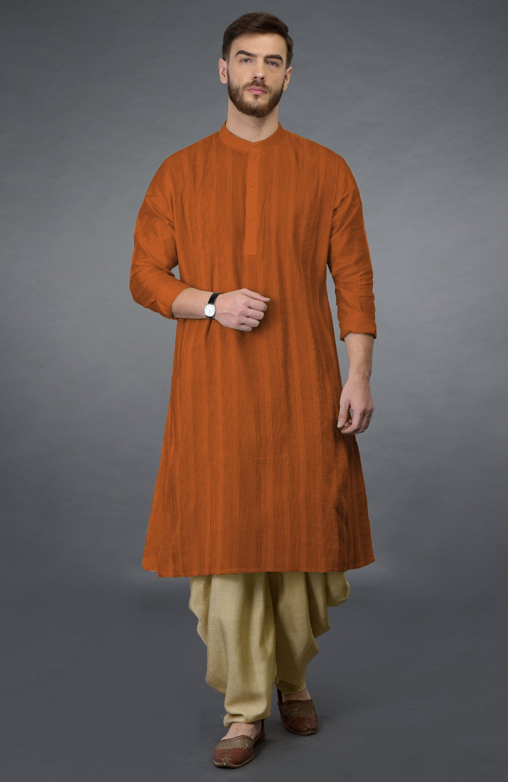 Gold flame kurta with pintuck details and beige gold dhoti style salwar pants.
