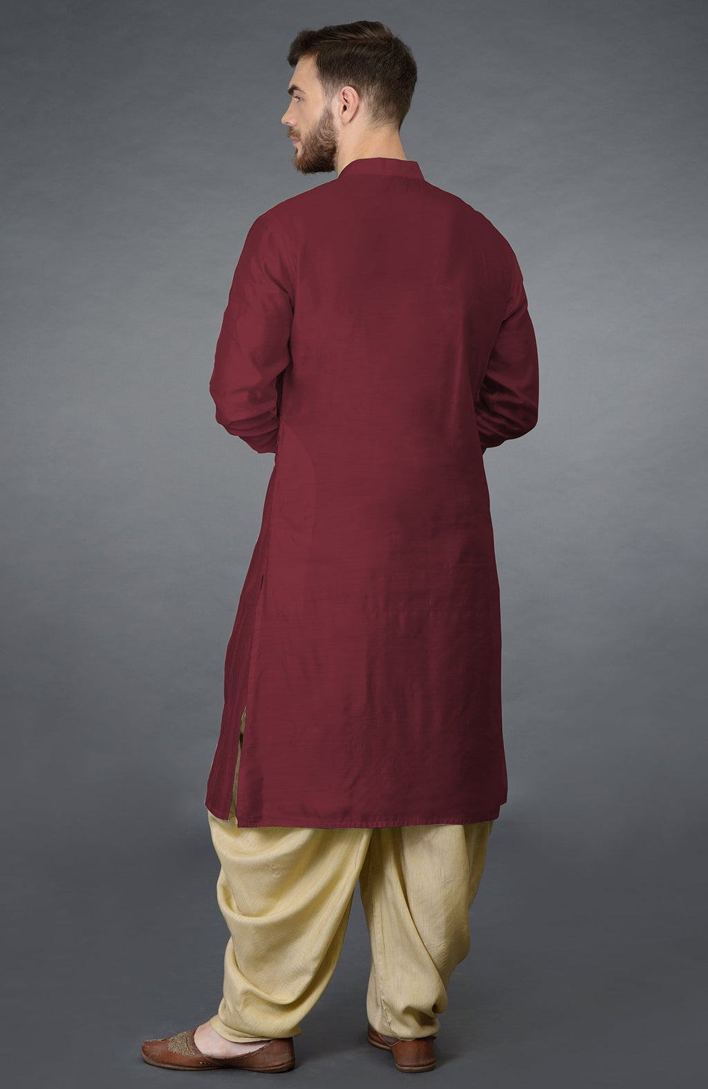 Pomegranate long-sleeve kurta with pintuck stitch and beige gold dhoti salwar pants.