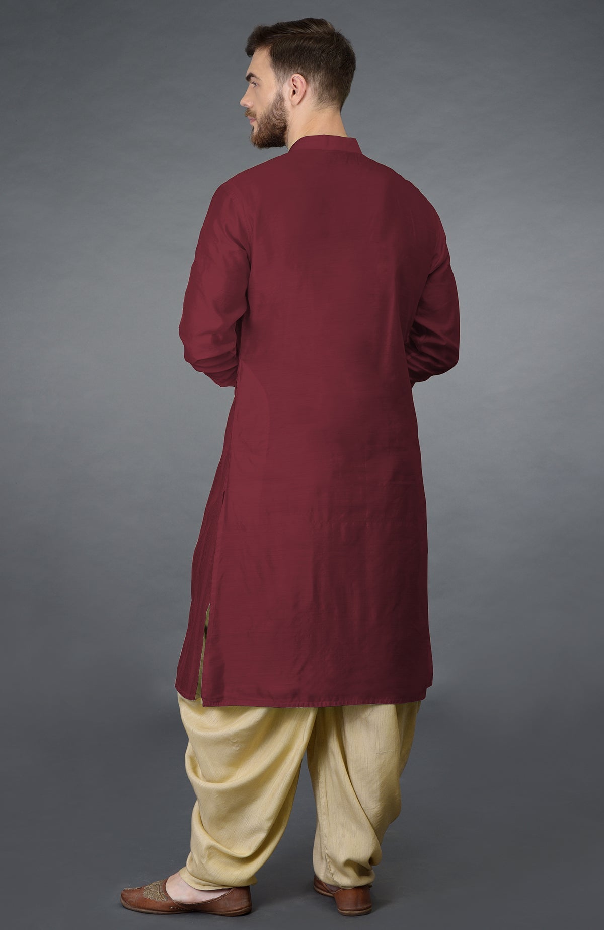 Pomegranate long-sleeve kurta with pintuck stitch and beige gold dhoti salwar pants.