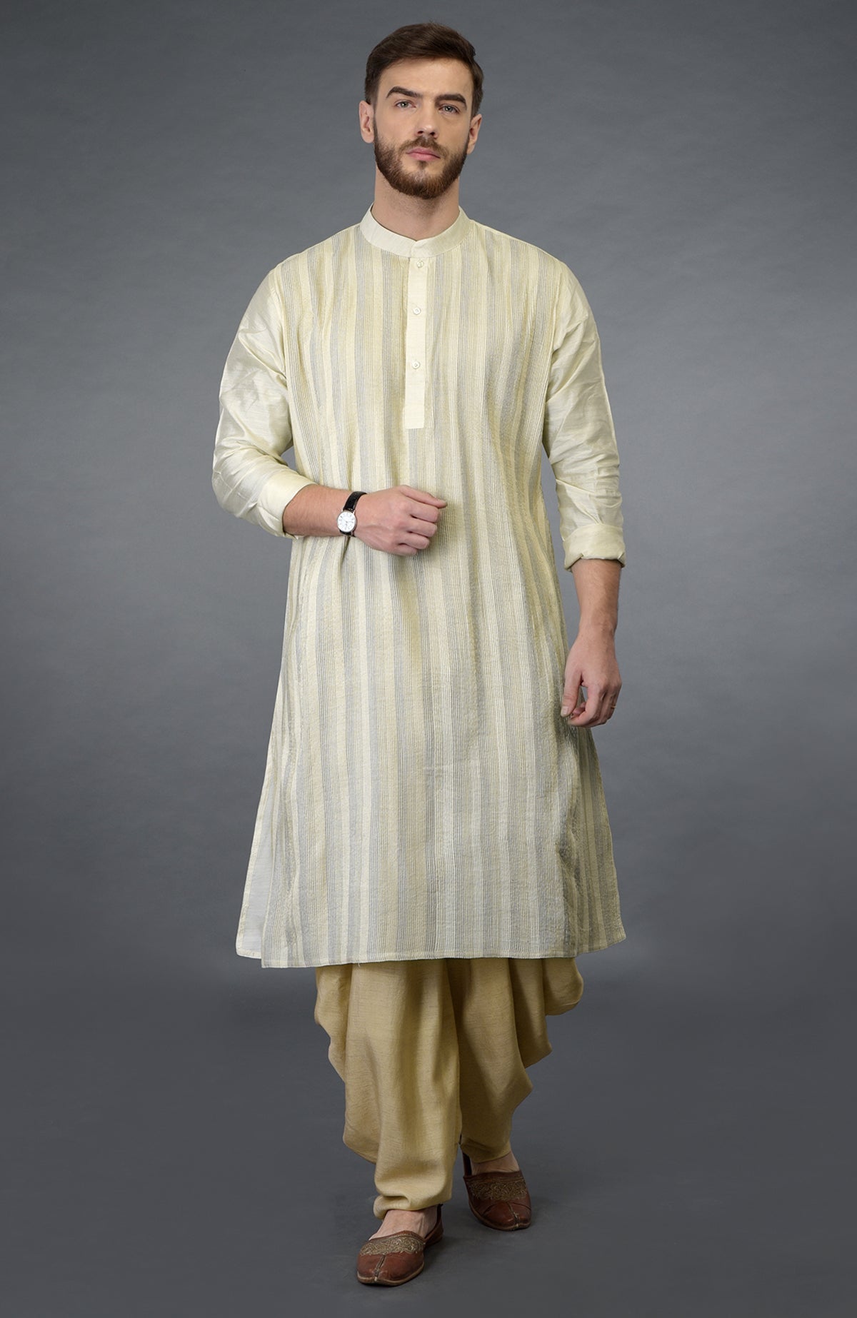 Cream pintuck pure silk kurta set with beige gold dhoti salwar pants.