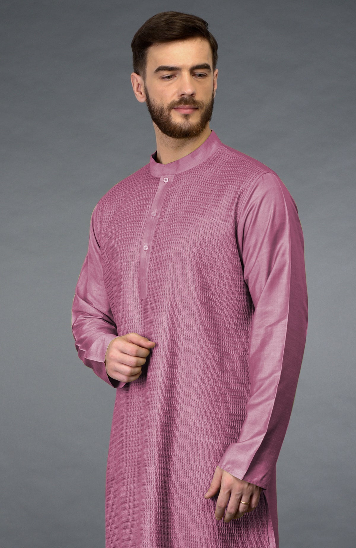 A man models a wine-colored pintuck kurta with a band collar.