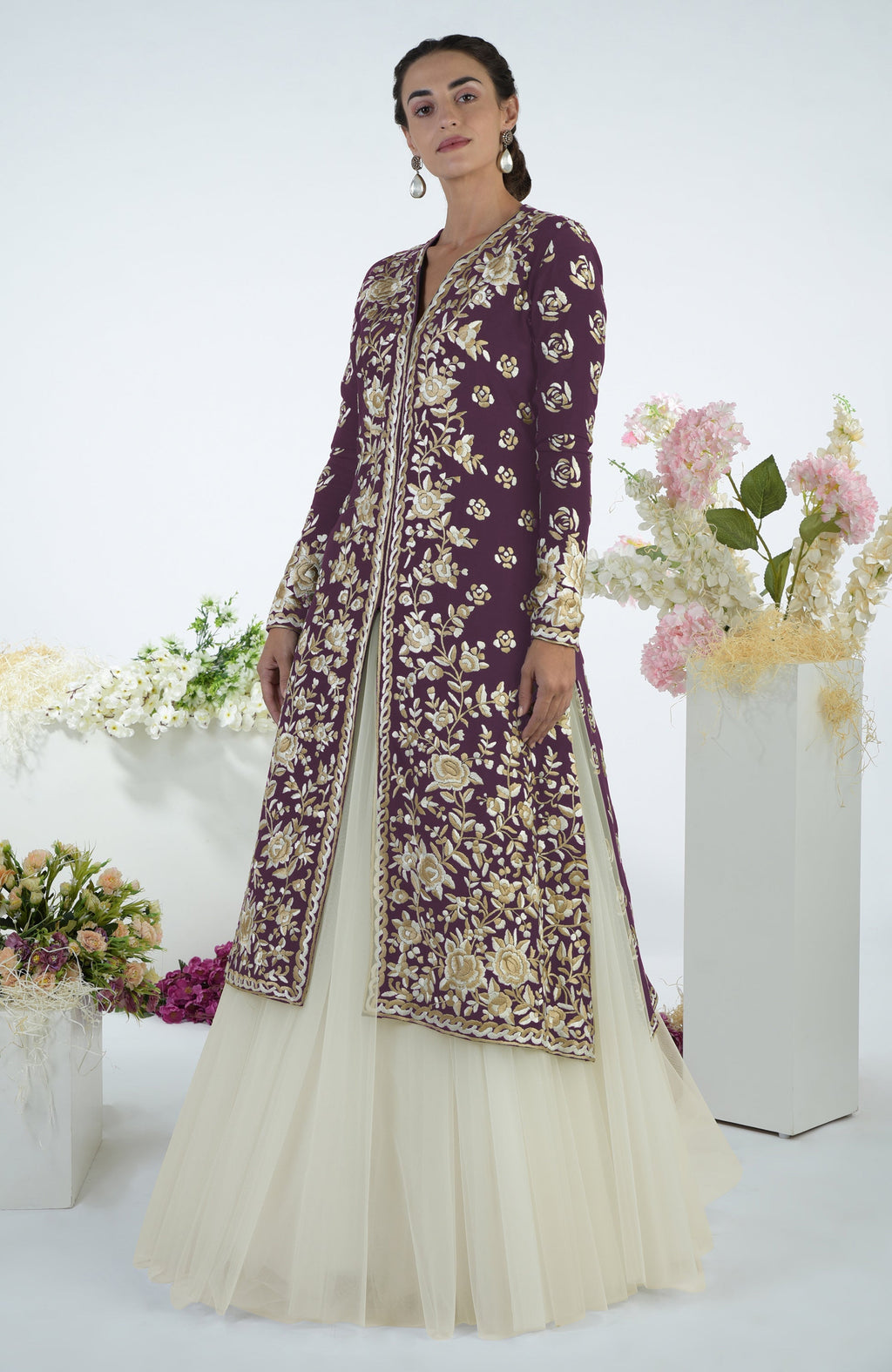 Plum jacket with ivory floral Parsi Gara embroidery paired with a full volume tulle skirt