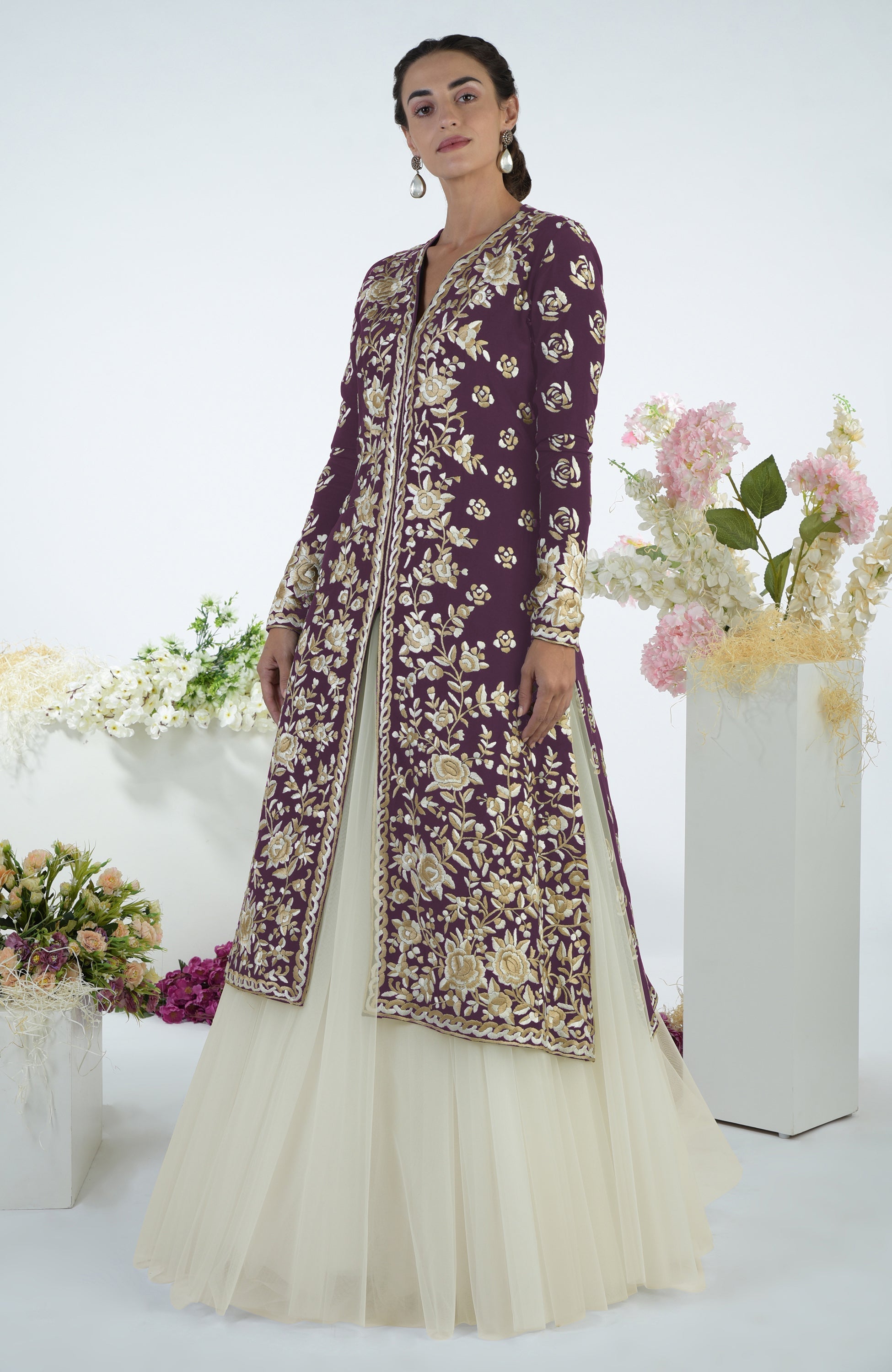Plum jacket with ivory floral Parsi Gara embroidery paired with a full volume tulle skirt
