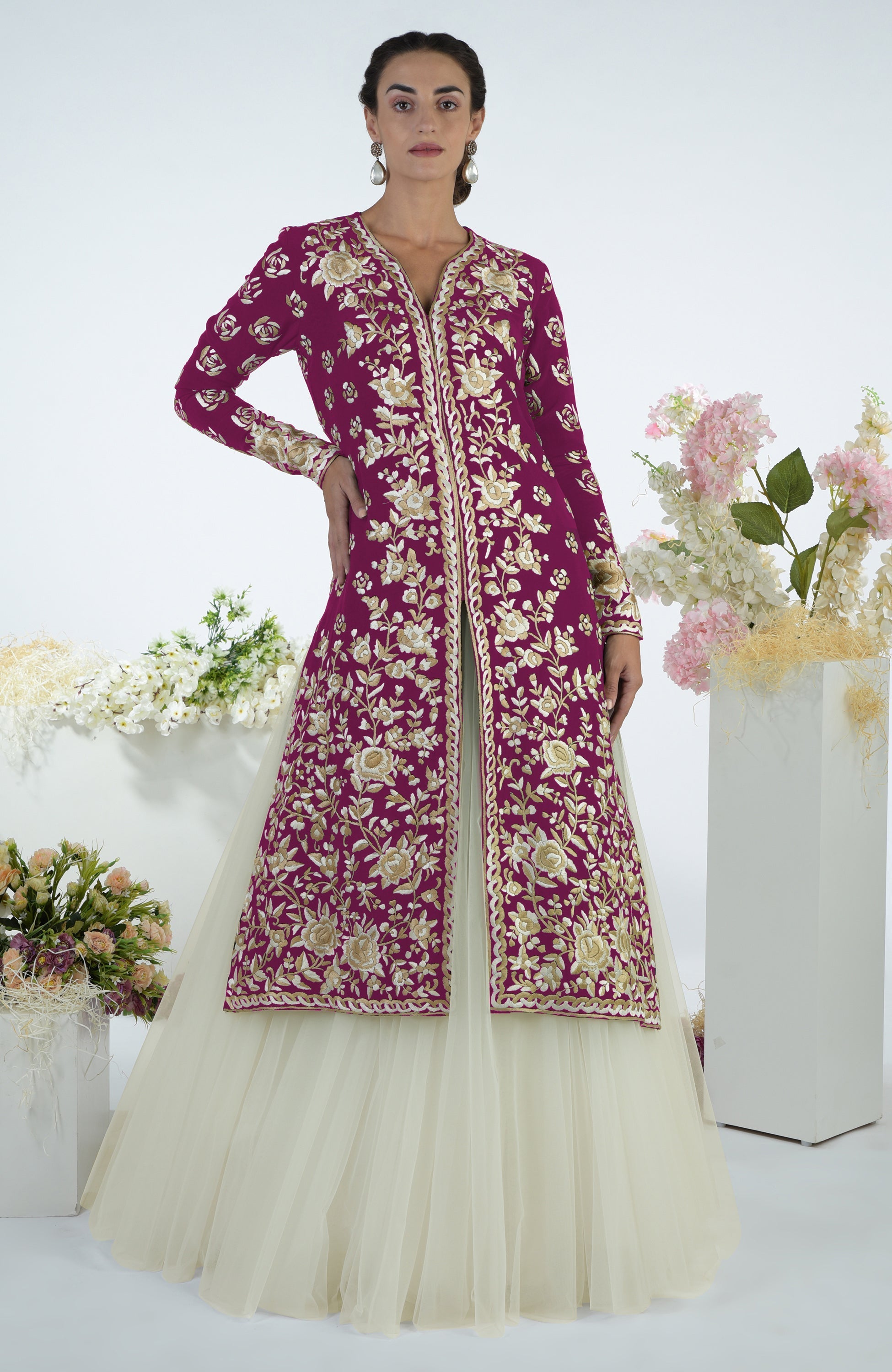 Black jacket with ivory floral Parsi Gara embroidery paired with a full volume tulle skirt