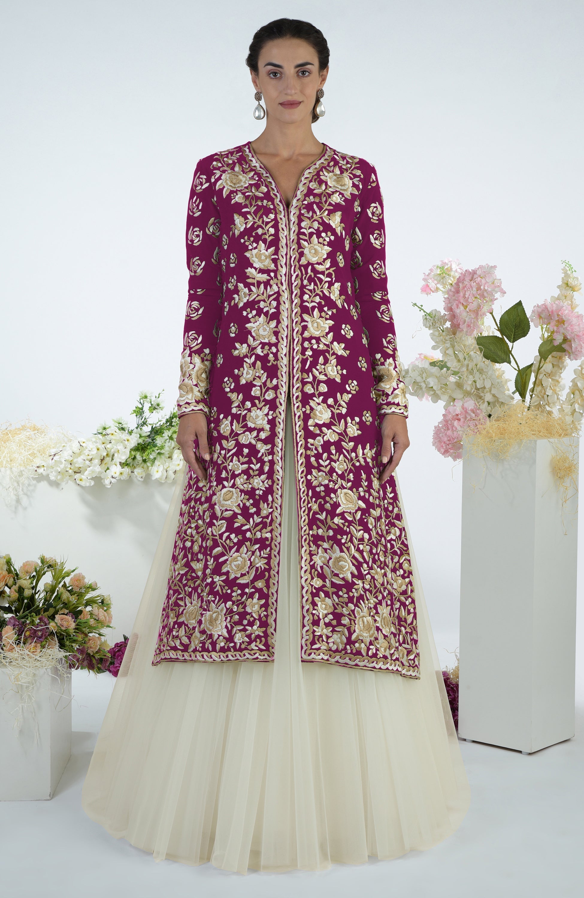 Peacock pink jacket with ivory and beige floral Parsi Gara embroidery and matching tulle skirt.