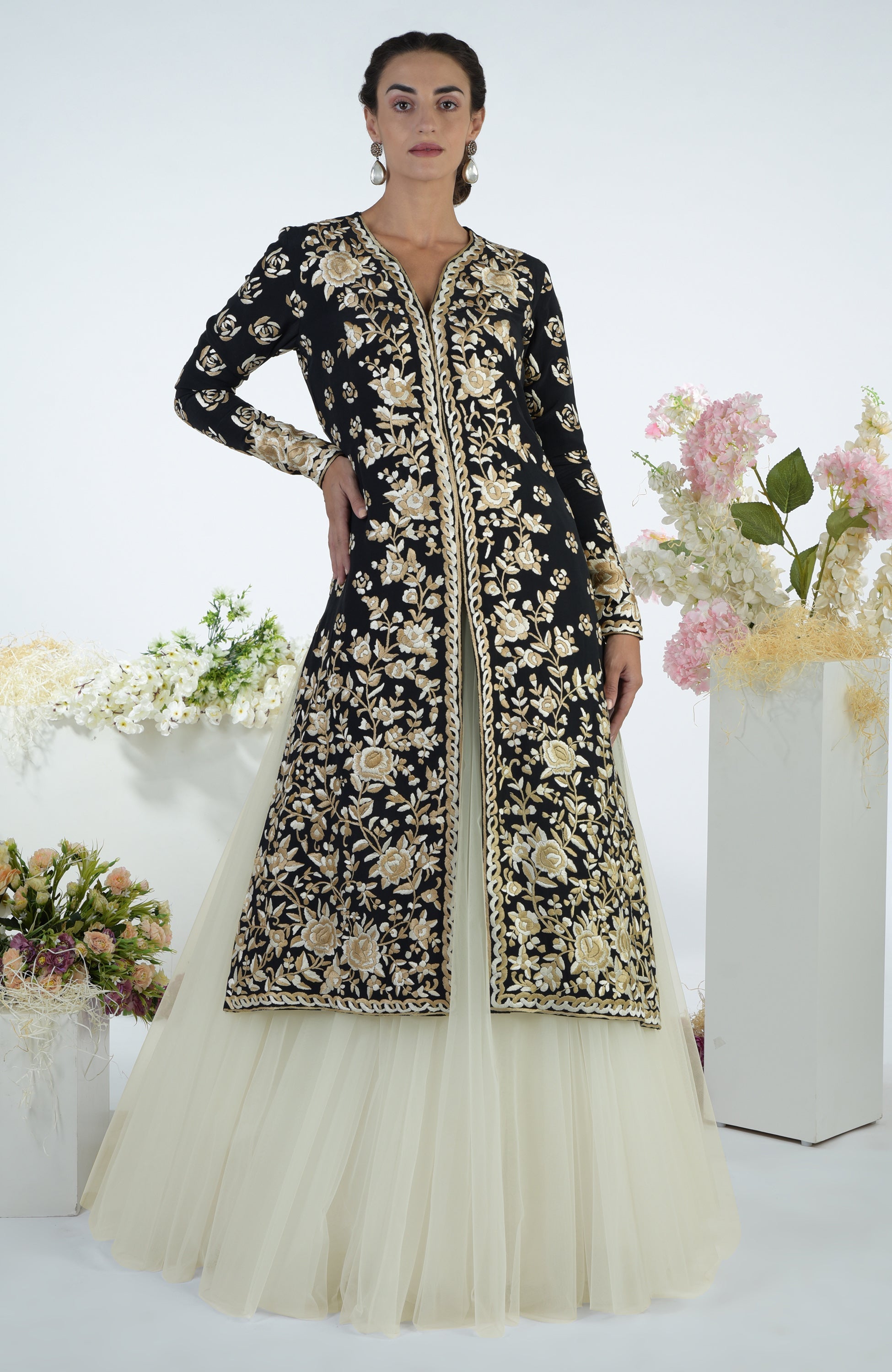 Black jacket with ivory and beige floral Parsi Gara embroidery paired with a full tulle skirt