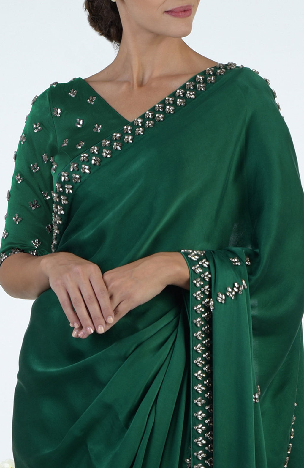 Emerald green crystal hand-embroidered saree and blouse.