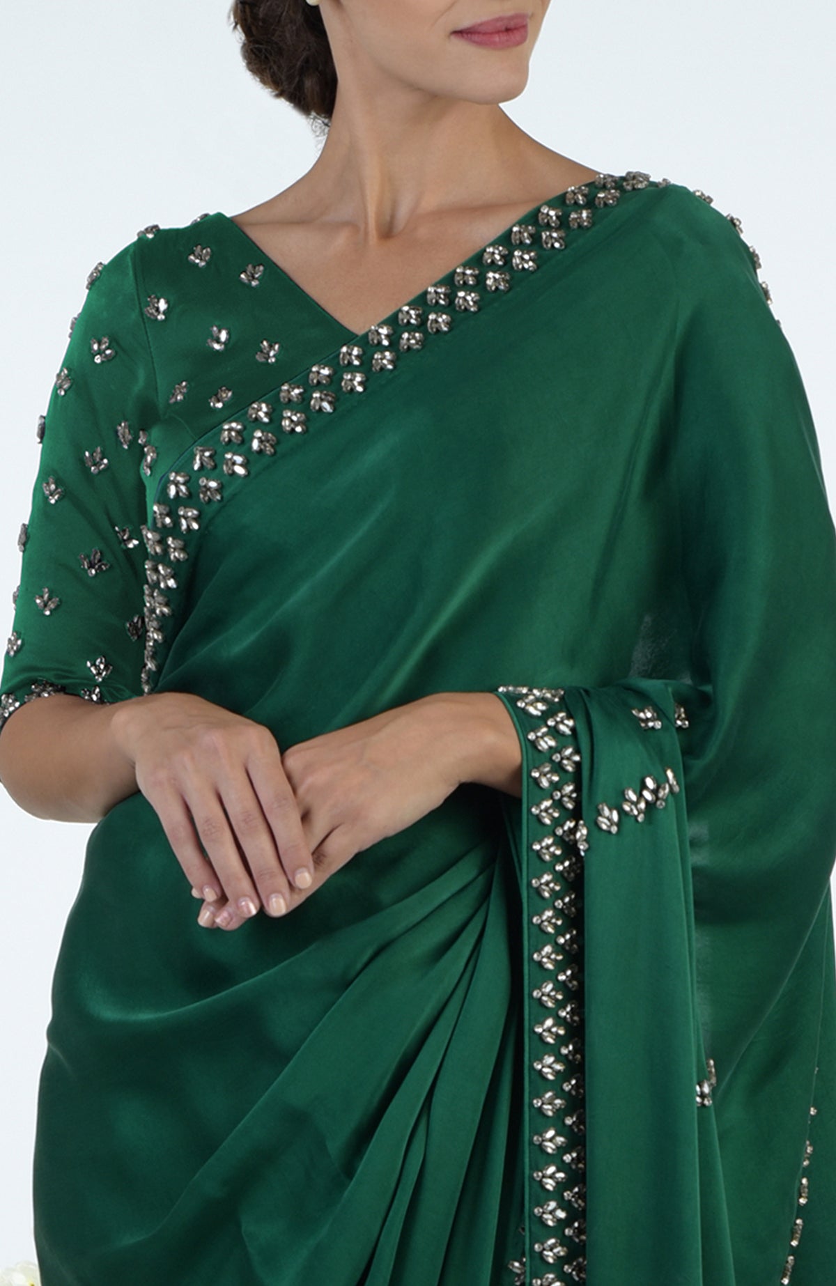 Emerald green crystal hand-embroidered saree and blouse.
