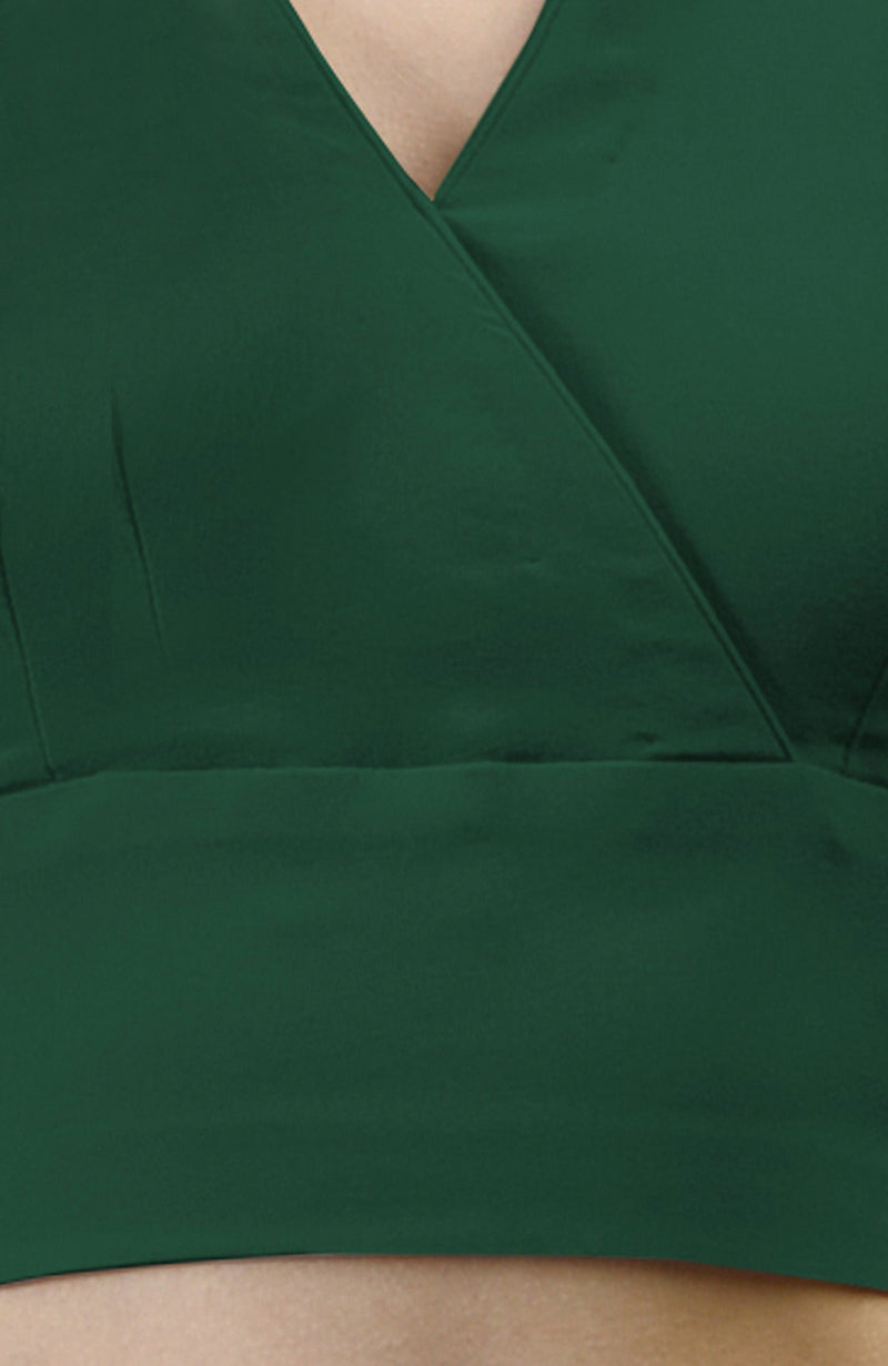 Emerald green V-neck blouse with an overlap front.