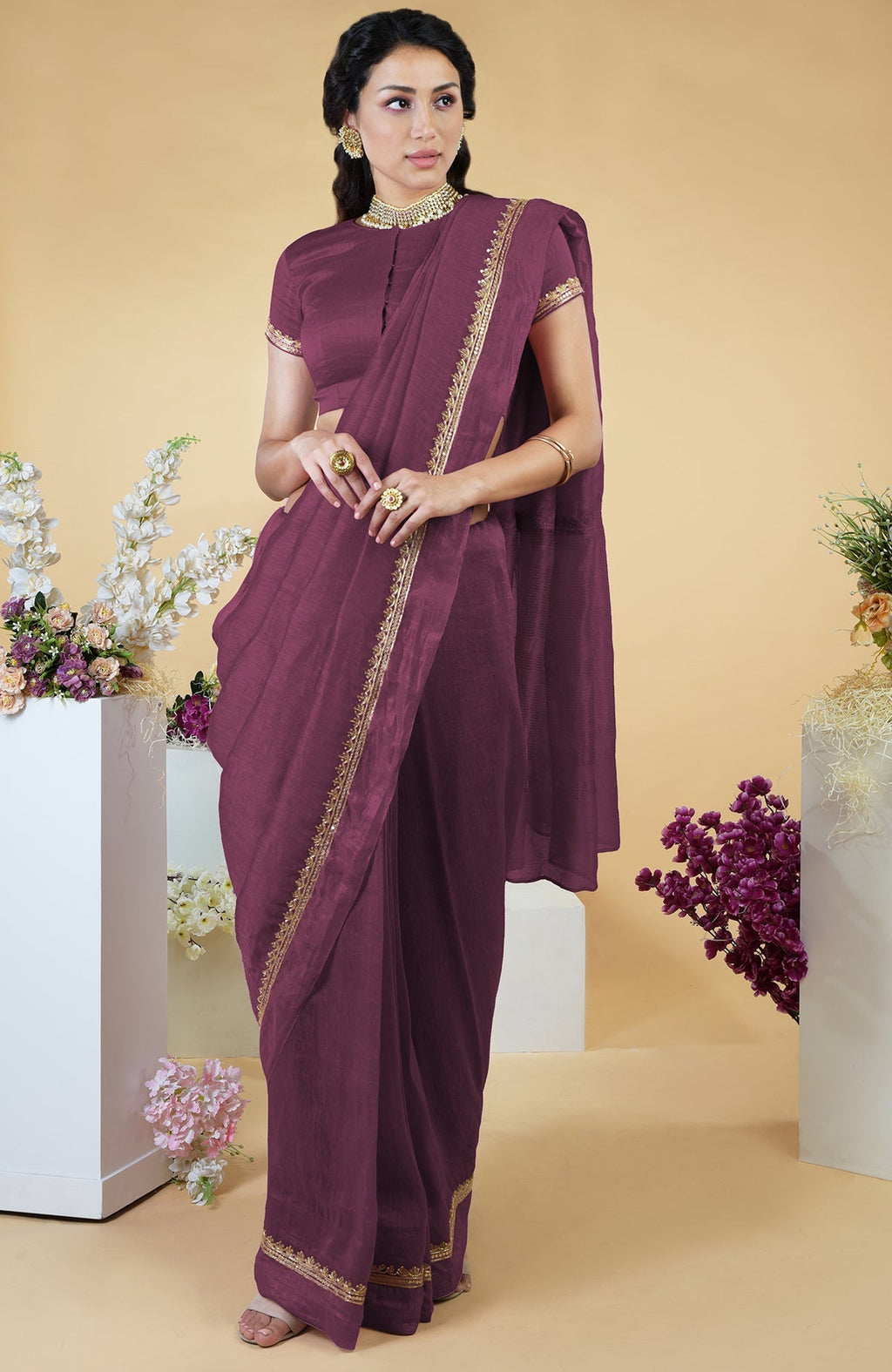 Burgundy purple linen saree with hand-embroidered gold zardozi work and matching blouse