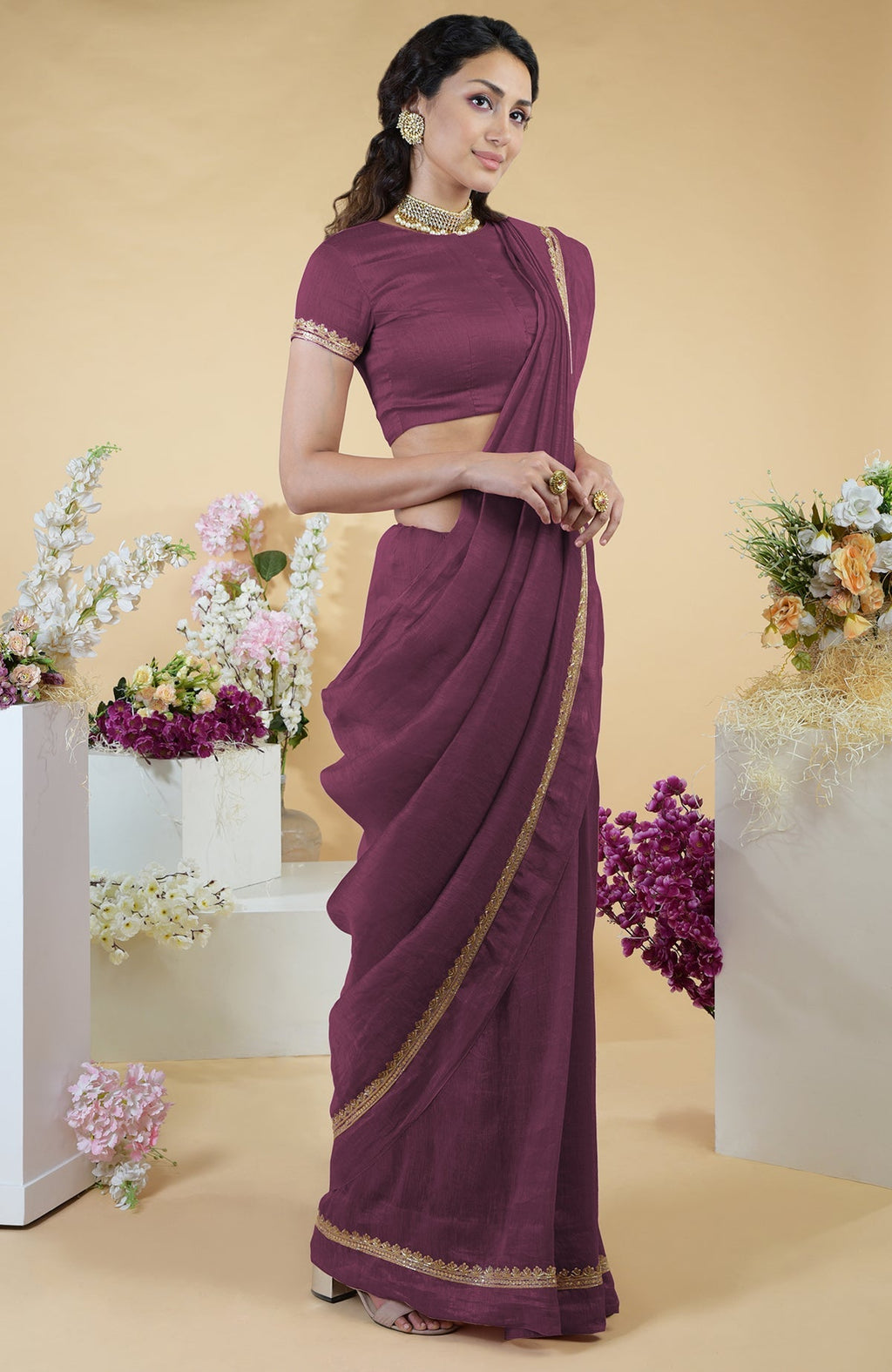 Burgundy purple linen saree with hand-embroidered gold zardozi work and matching blouse