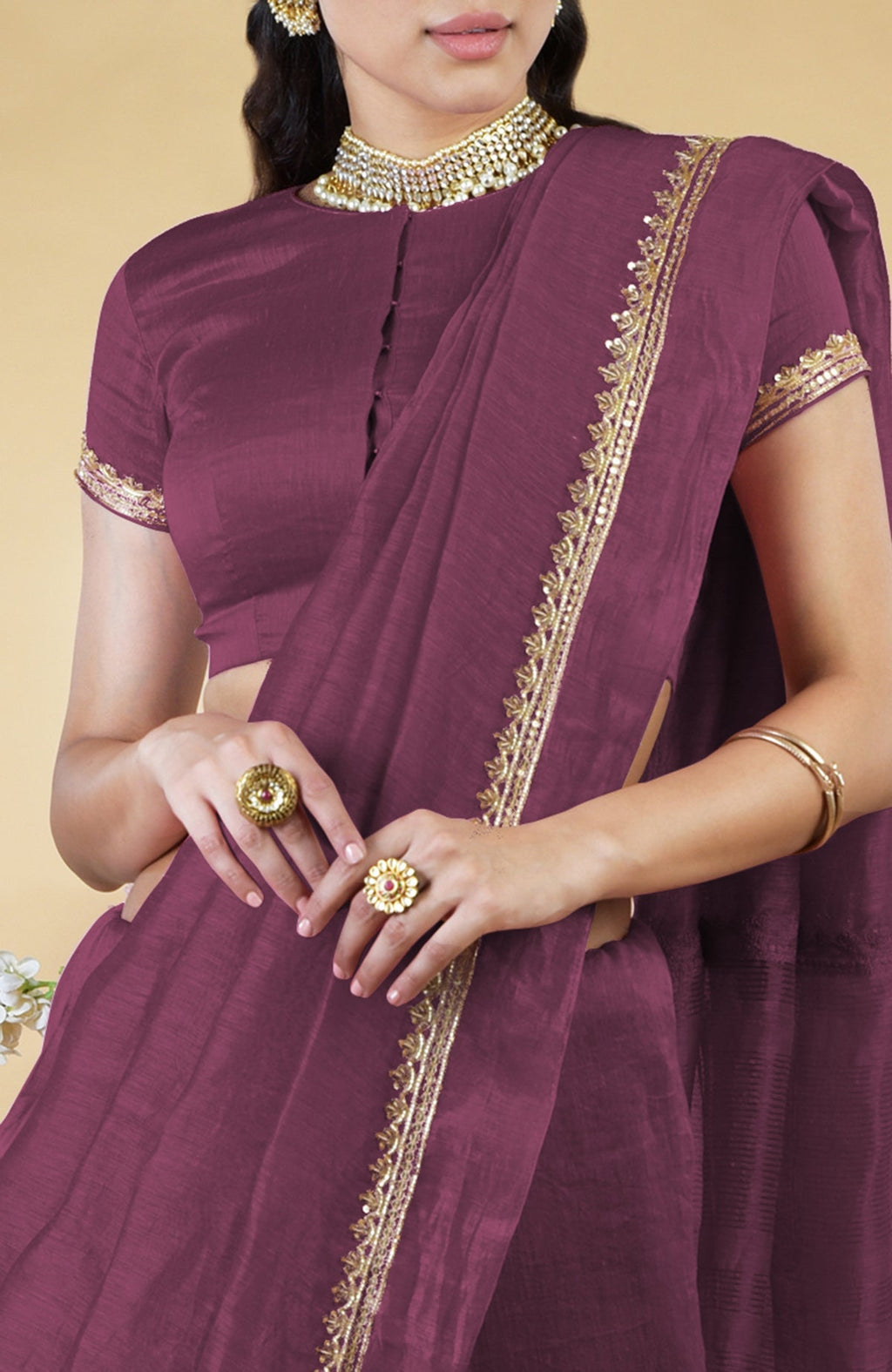 Burgundy purple linen saree with hand-embroidered gold zardozi work and matching blouse