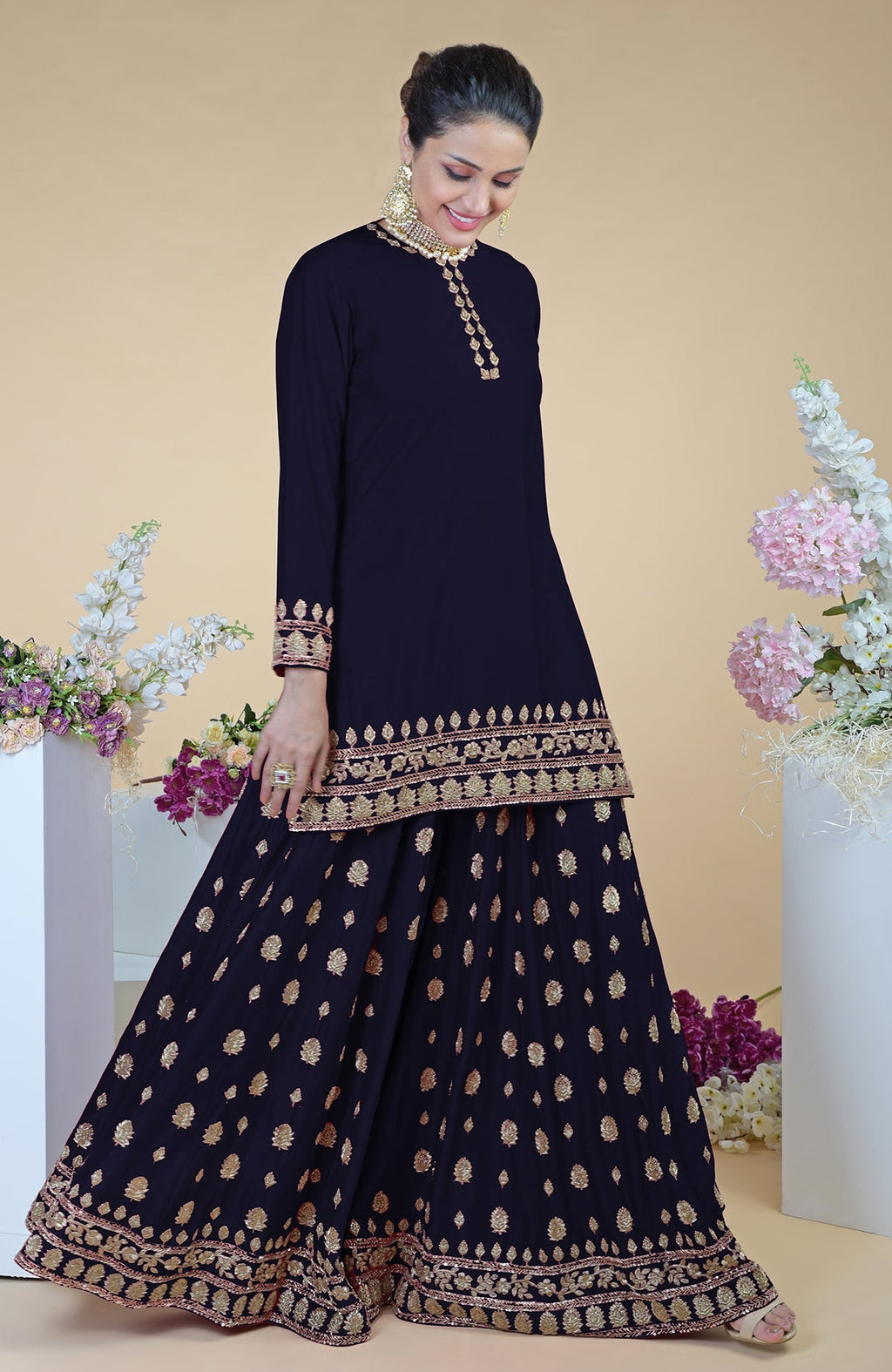 Midnight blue sharara set with gold zardozi dabka and sequin hand embroidery.