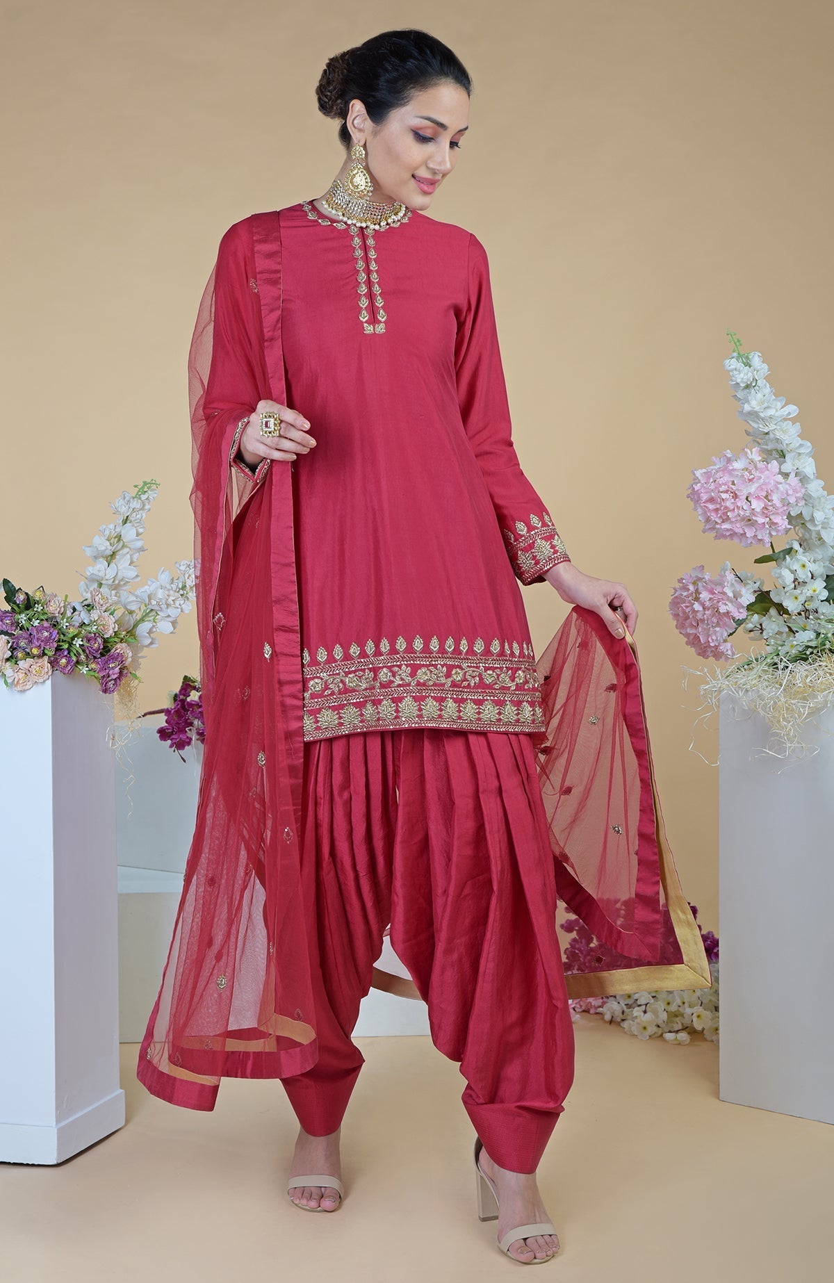 Red Zardozi Hand Embroidered Salwar Suit with a sheer tulle dupatta.