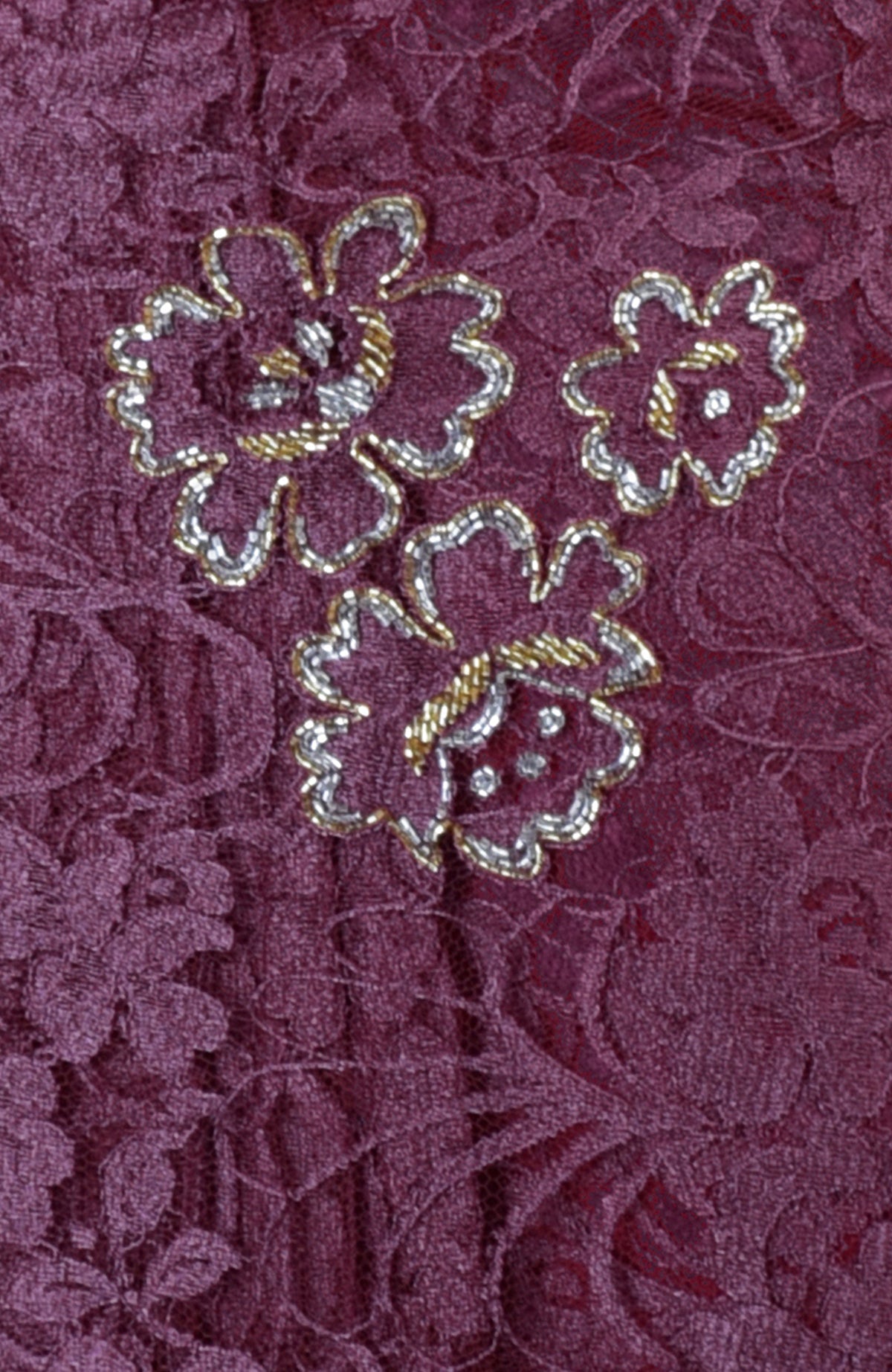 Wine French Chantilly saree with gold and silver hand-embroidered floral motifs.