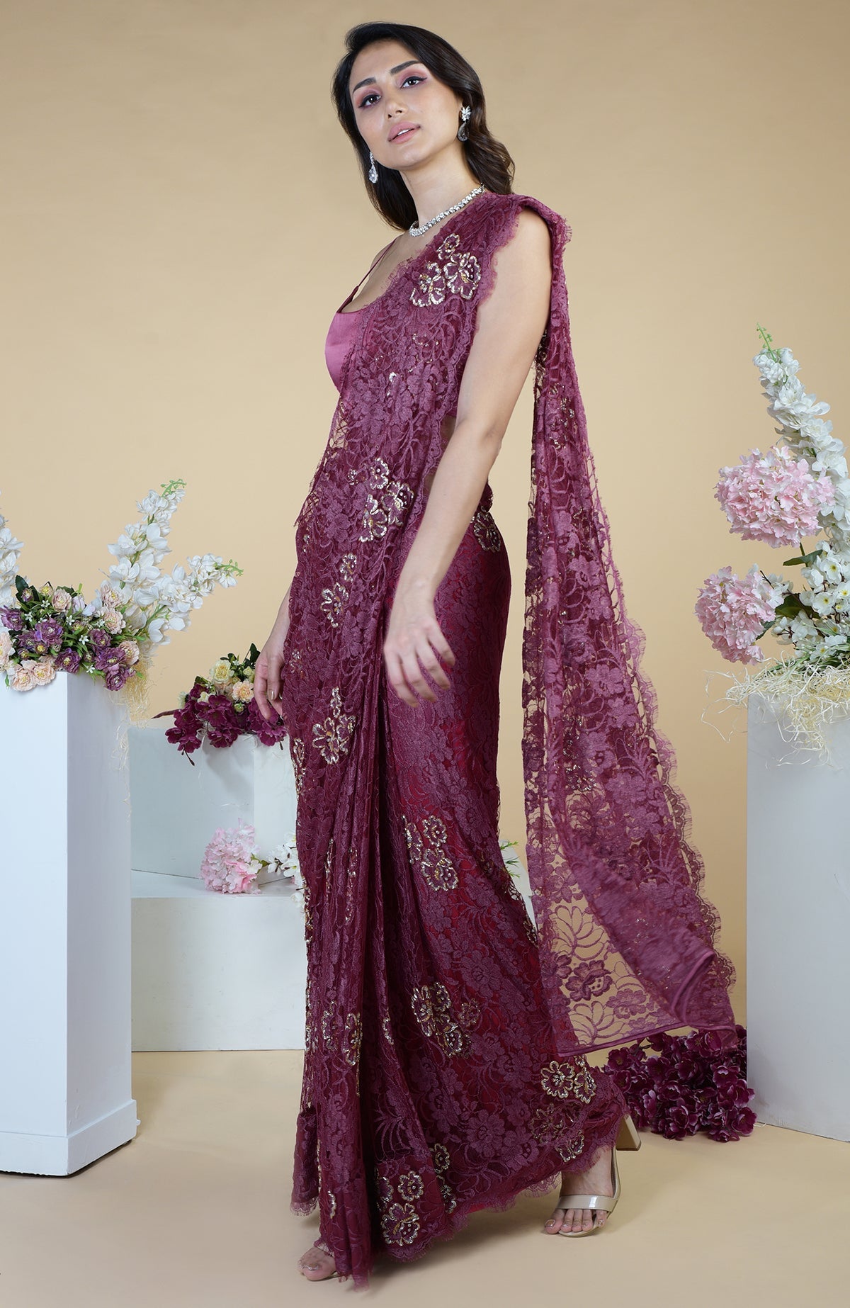 Wine French Chantilly hand-embroidered saree with gold and silver cut beads.