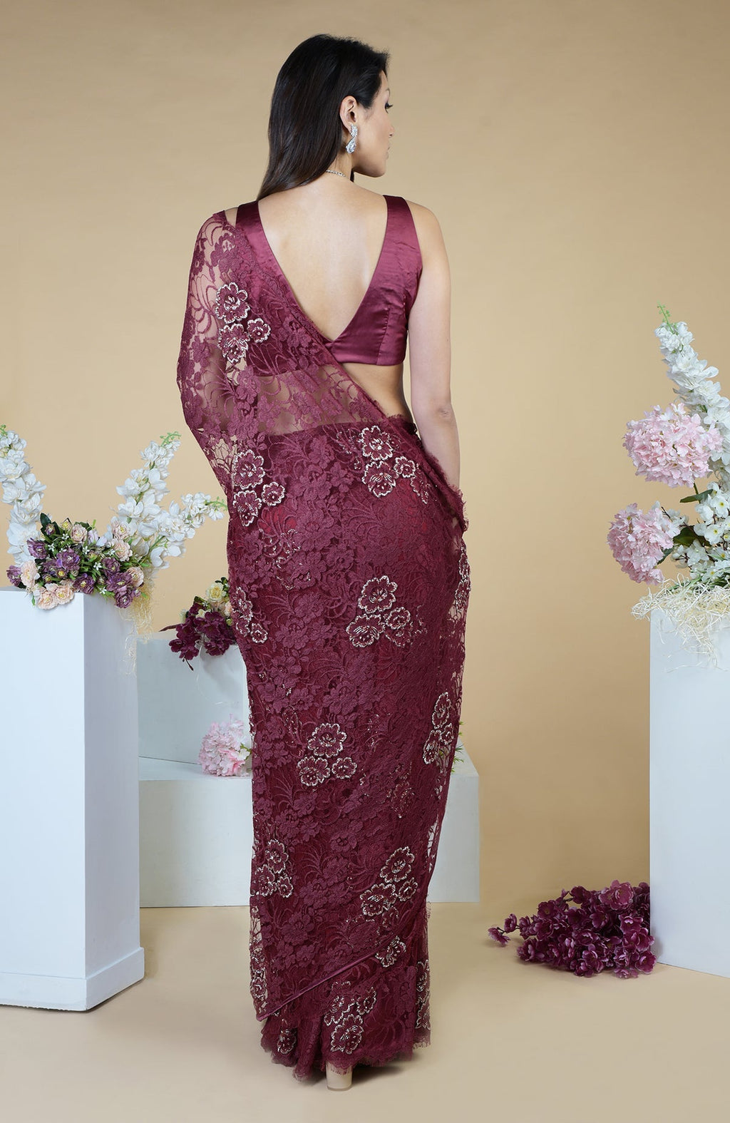 Burgundy French Chantilly hand-embroidered saree with floral motifs.