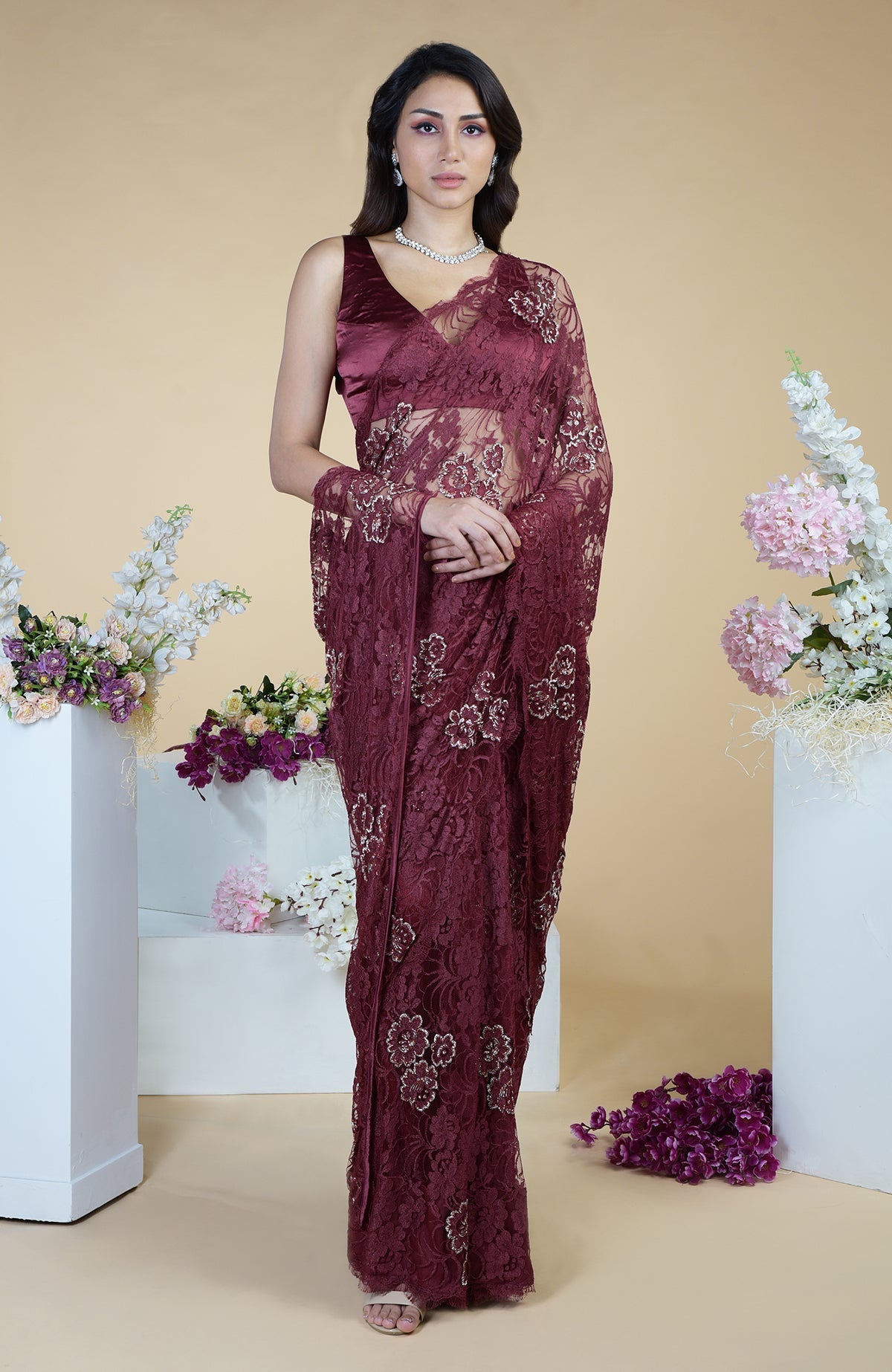 Burgundy French Chantilly hand-embroidered saree with floral motifs.