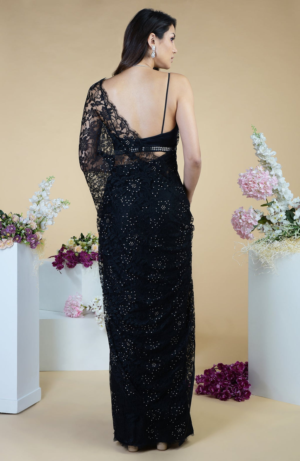Black French Chantilly lace saree with Swarovski crystals and an embellished blouse.