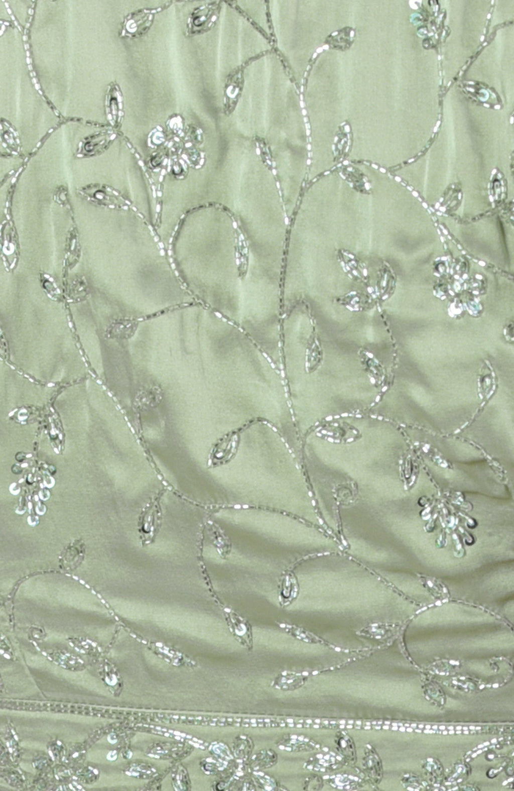 Pastel mint saree with silver beads and sequin floral hand embroidery.