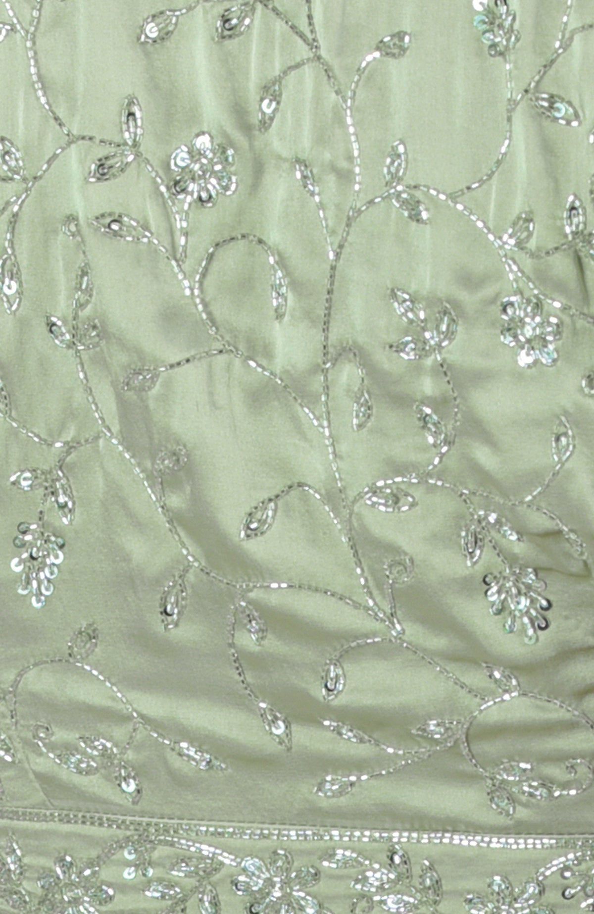 Pastel mint saree with silver beads and sequin floral hand embroidery.
