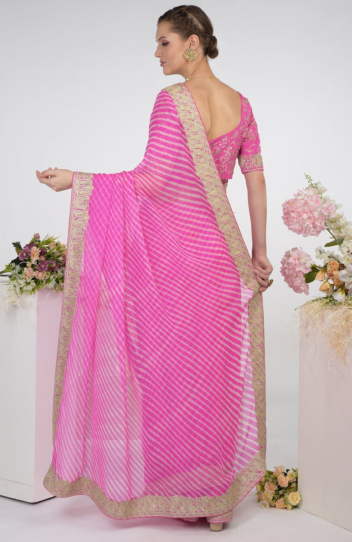 Pink leheriya saree with Kashmiri paisley tilla aari embroidery.
