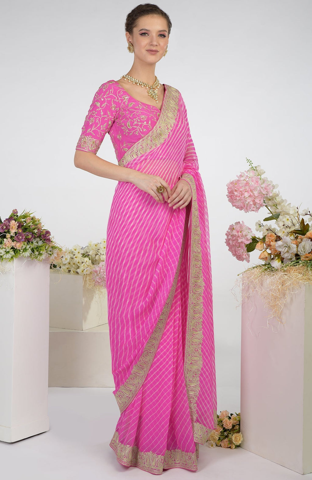 Pink Leheriya Kashmiri Paisley Tilla Aari Embroidered Saree with a matching blouse.