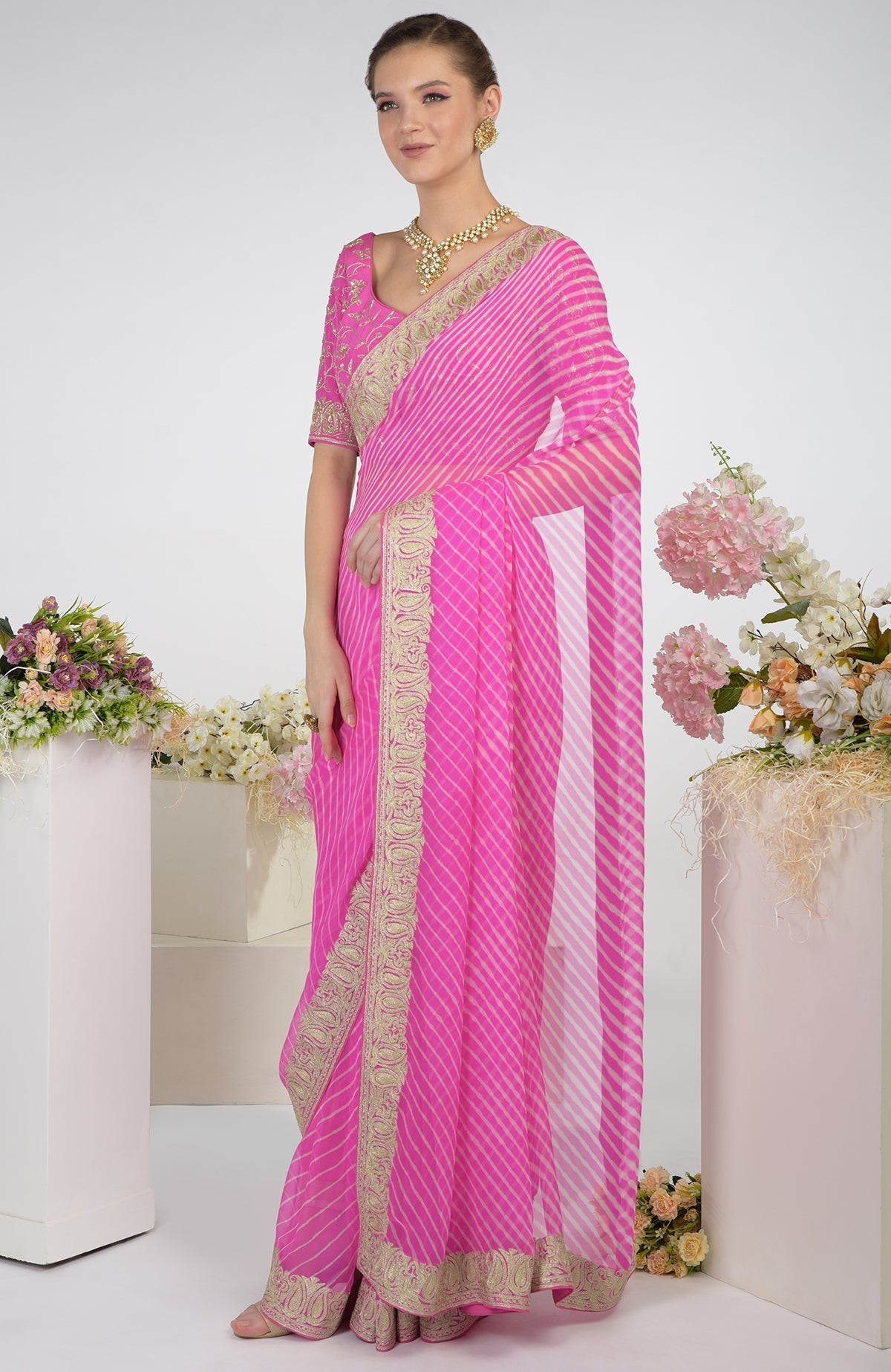Pink Leheriya Kashmiri Paisley Tilla Aari Embroidered Saree with a matching blouse.