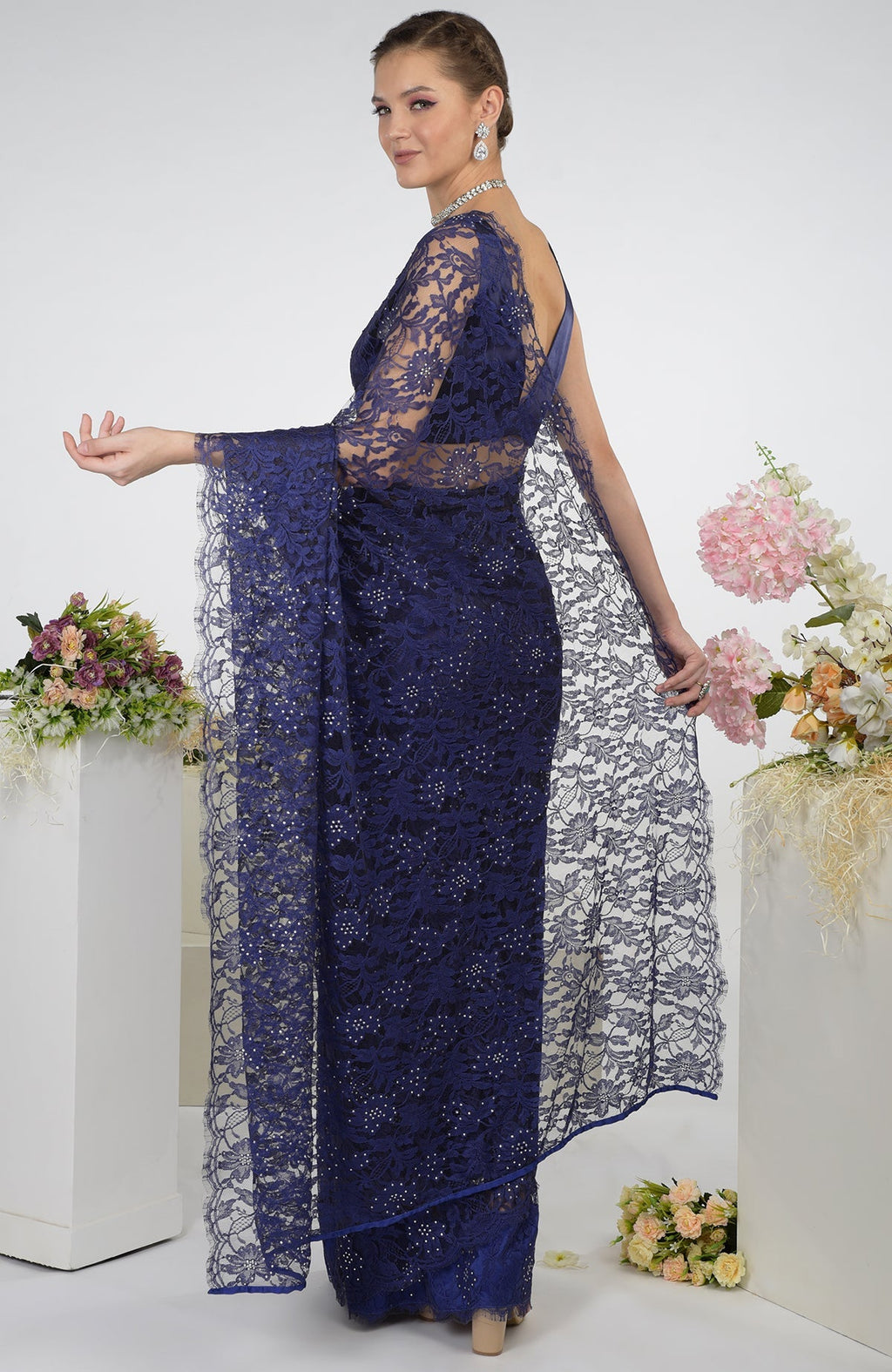 Eclipse blue French Chantilly lace saree with Swarovski crystals.