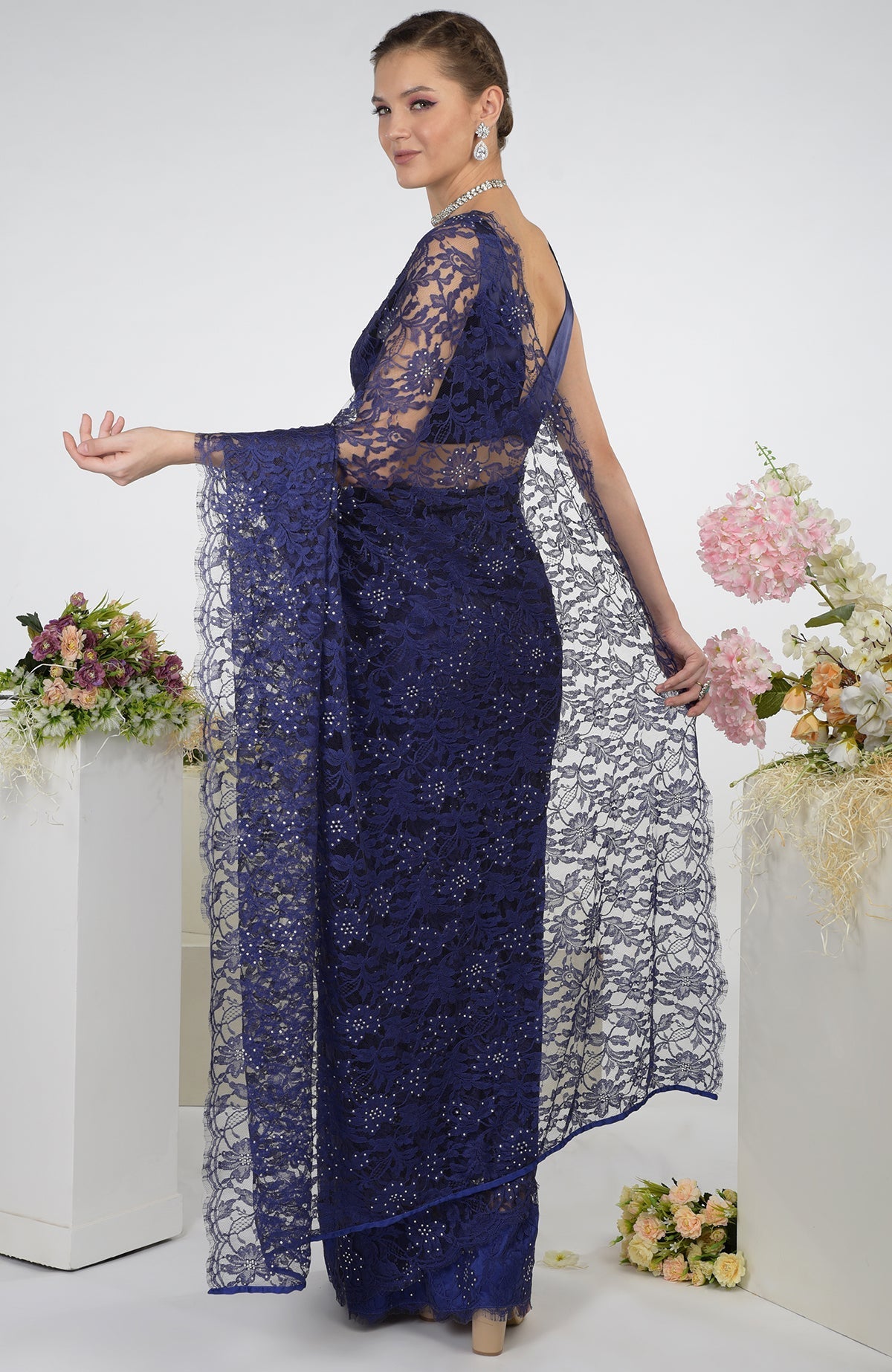 Eclipse blue French Chantilly lace saree with Swarovski crystals.